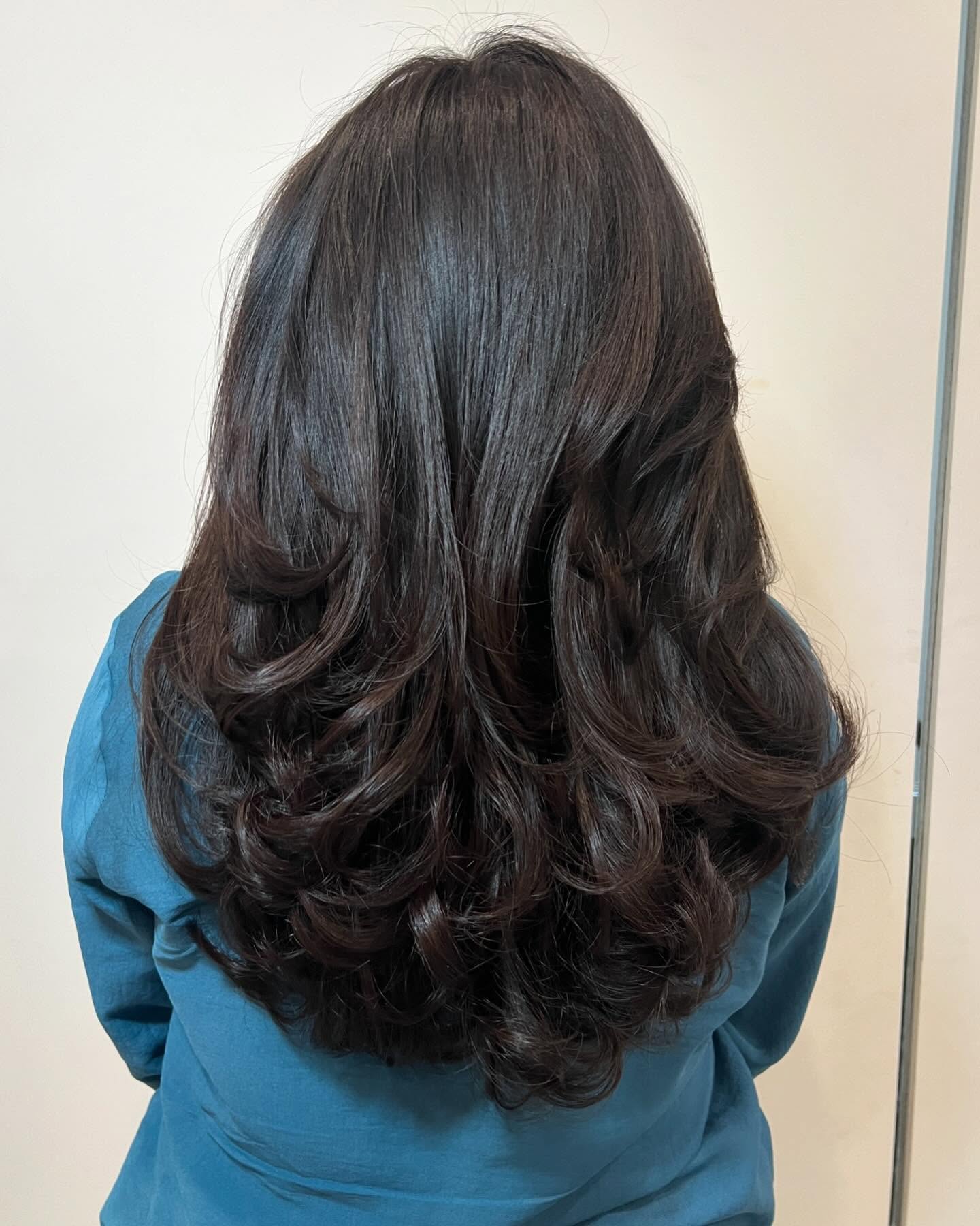 Rich Dark Layered Curls with Soft Movement