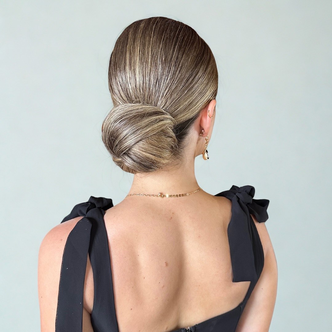 Sleek Chignon with Subtle Highlights