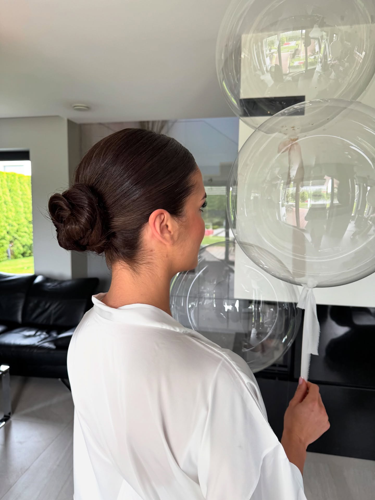 Sleek Elegant Low Bun with Smooth Finish