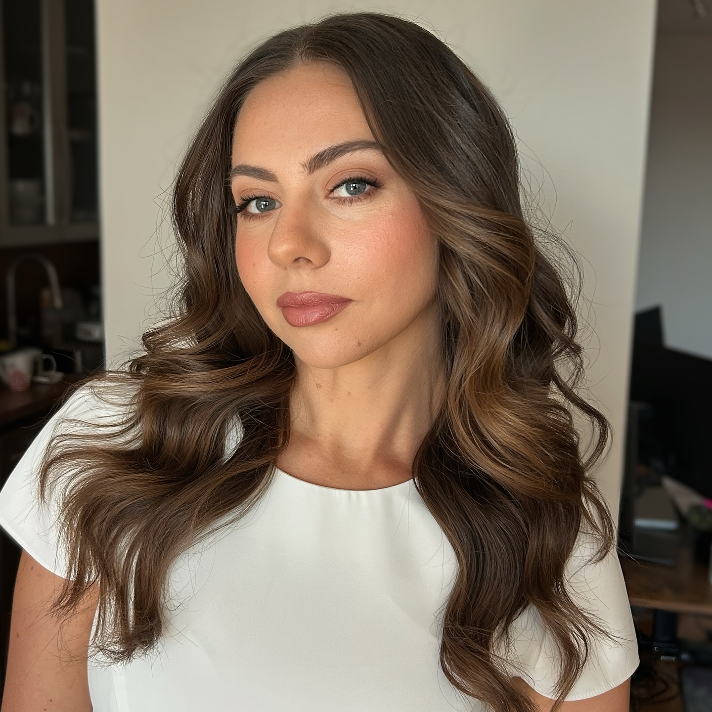 Soft Cascading Waves with Warm Balayage Highlights