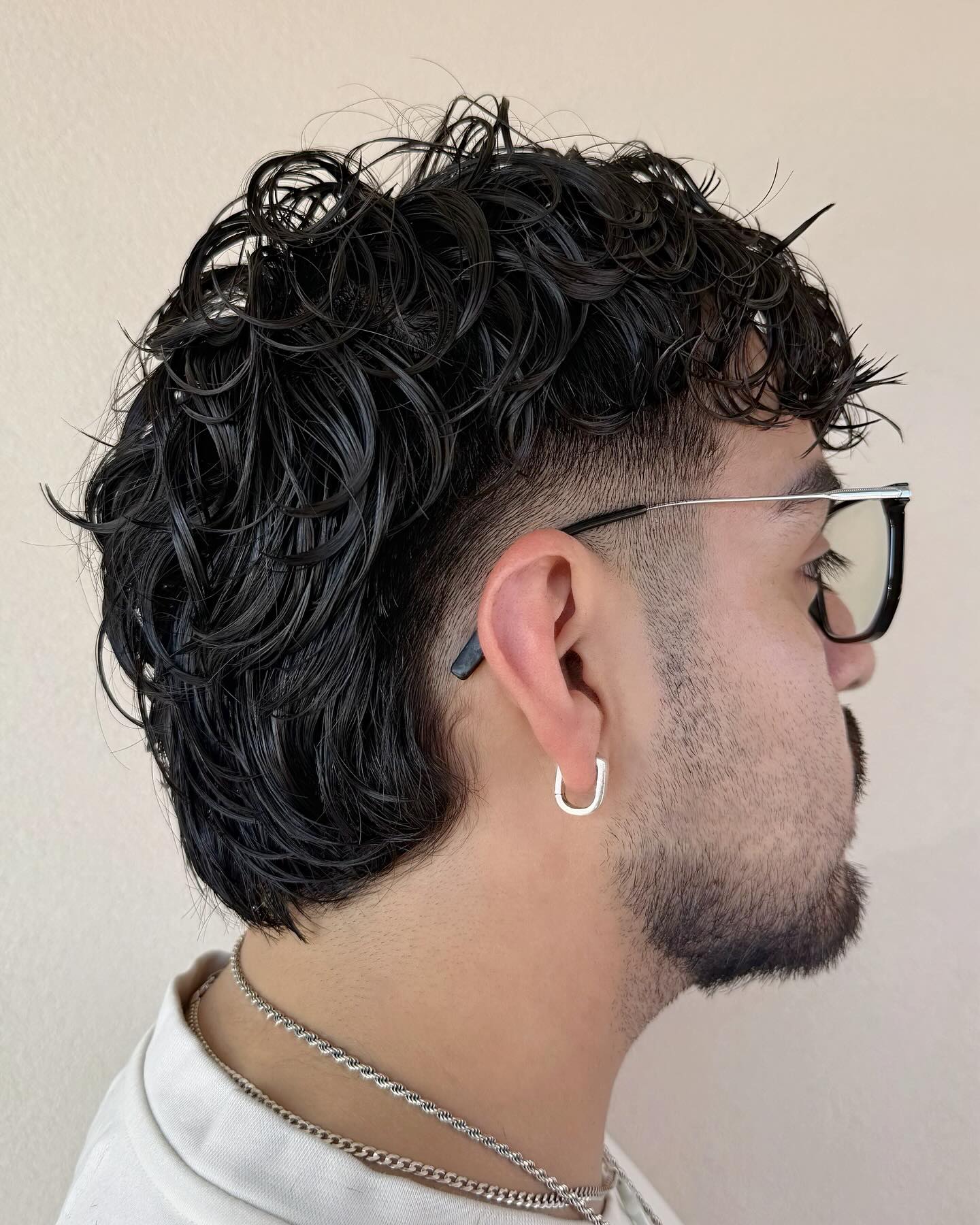 Trendy Curly Undercut with Defined Waves