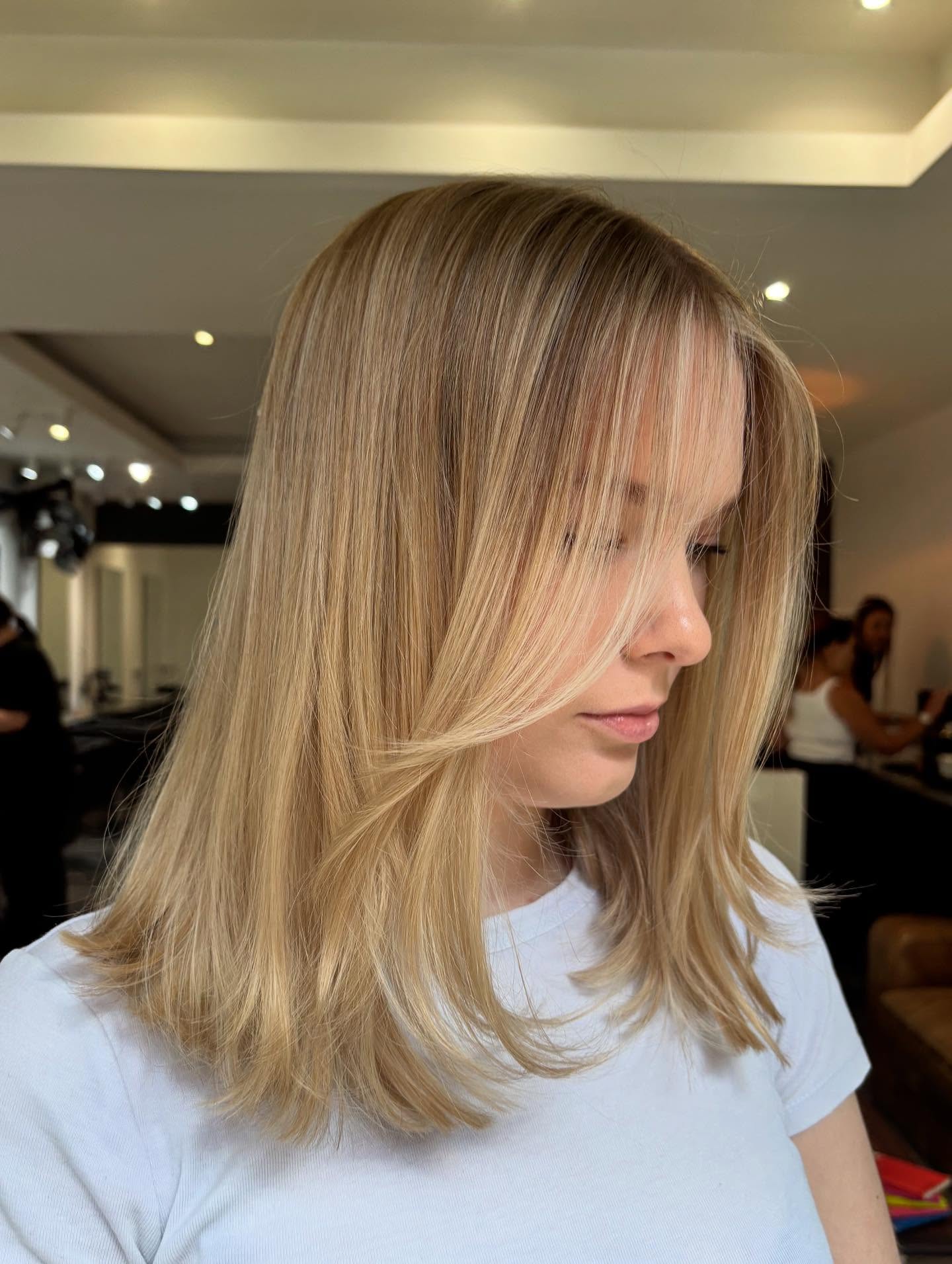 Softly Layered Blonde Cut with Natural Movement