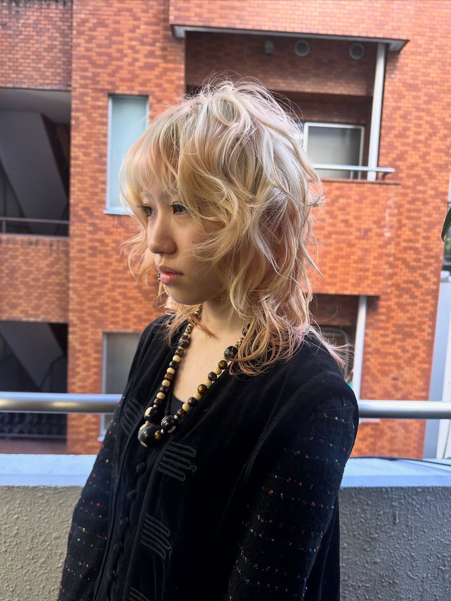 Textured Fluffy Blonde Shag with Soft Curls