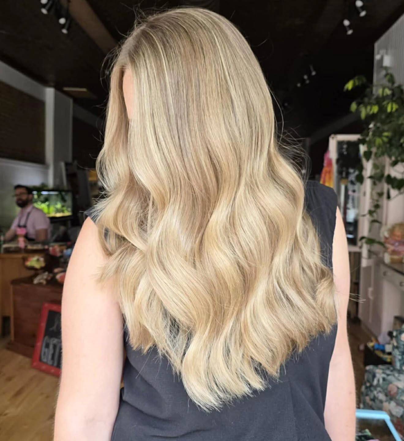 Textured Long Blonde Waves with Subtle Dimension
