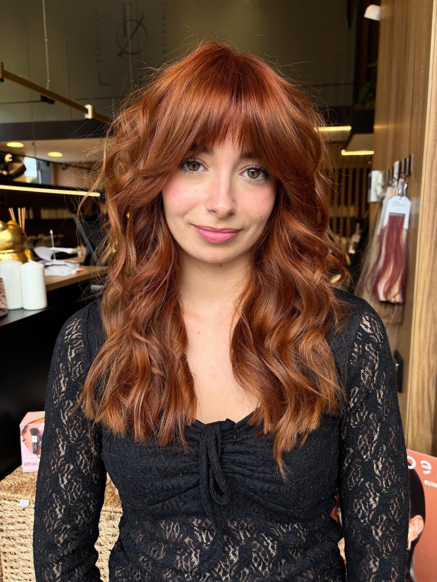 Bold Copper Layered Shag with Wispy Bangs