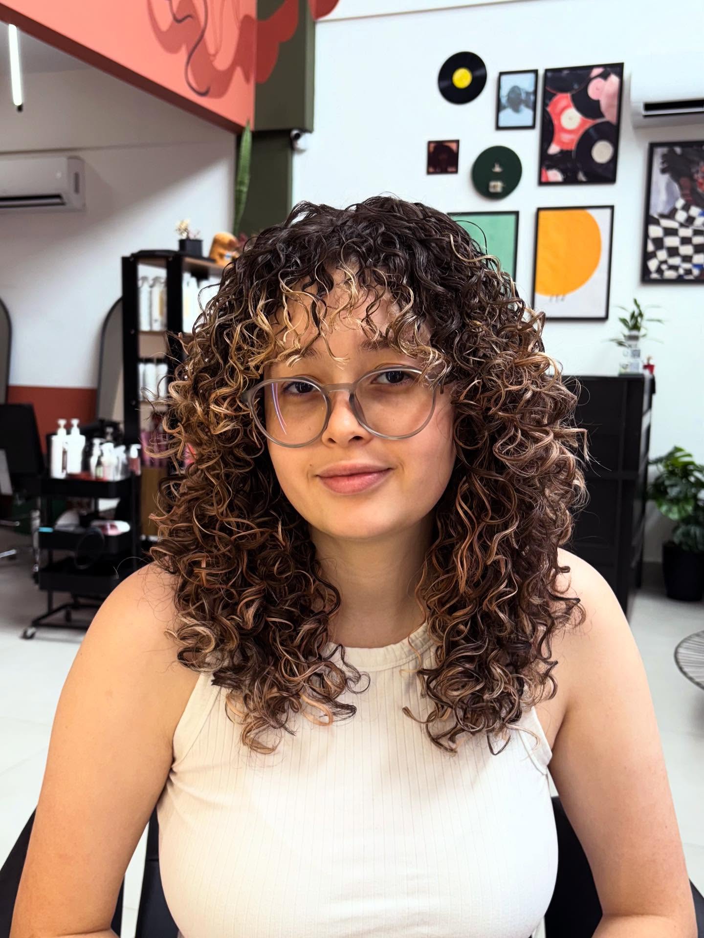 Curly Layered Shag with Subtle Highlights