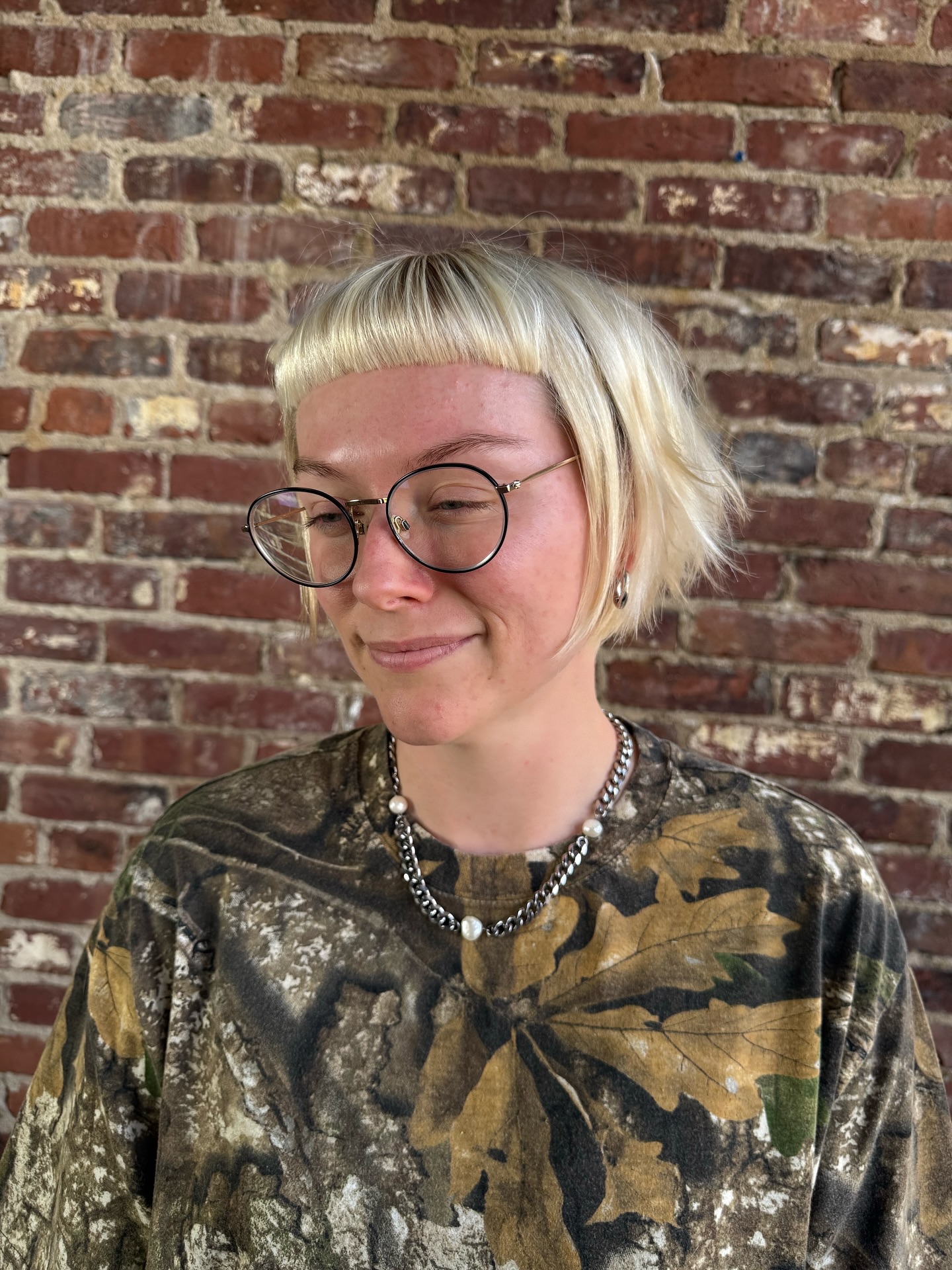 Edgy Platinum Blonde Crop with Soft Bangs