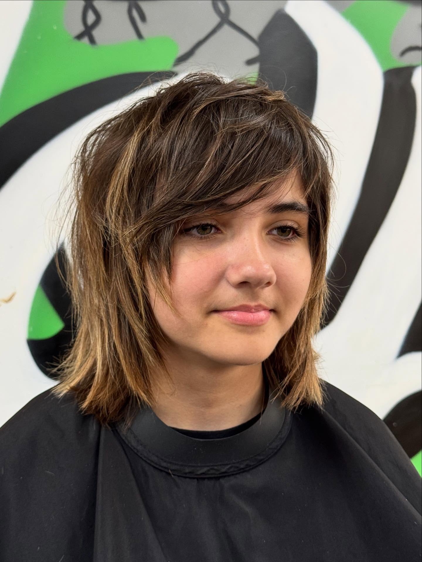 Effortlessly Tousled Chestnut Layers with Soft Bangs