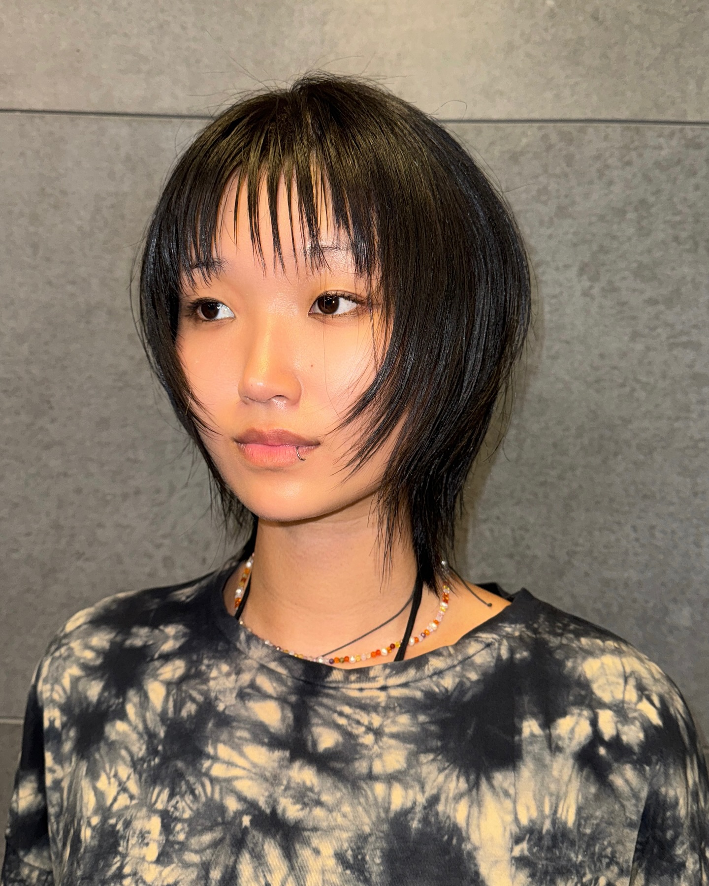 Sleek Short Choppy Layer with Textured Fringe