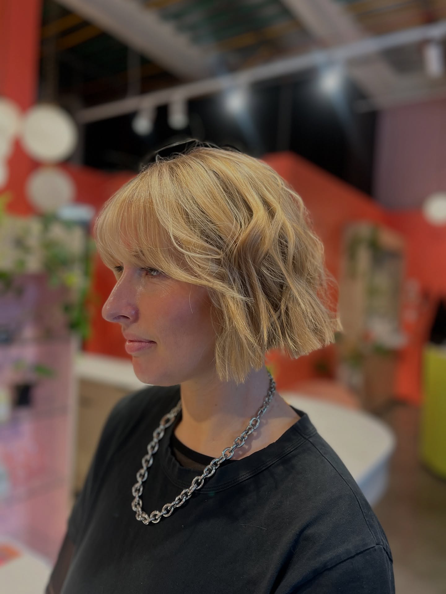 Softly Tousled Golden Blonde Bob with Wispy Bangs