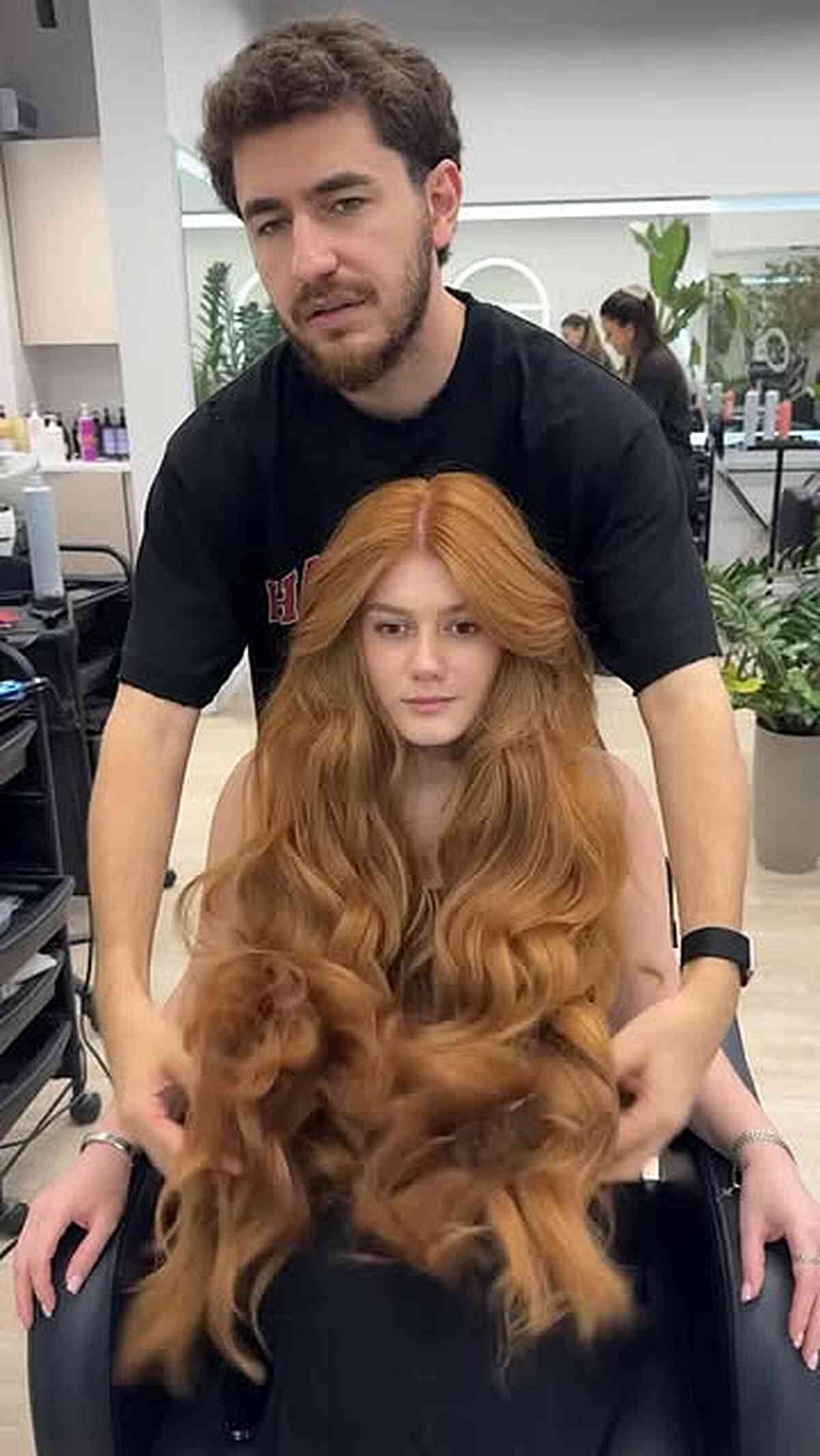 Luxurious Strawberry Blonde Layered Waves