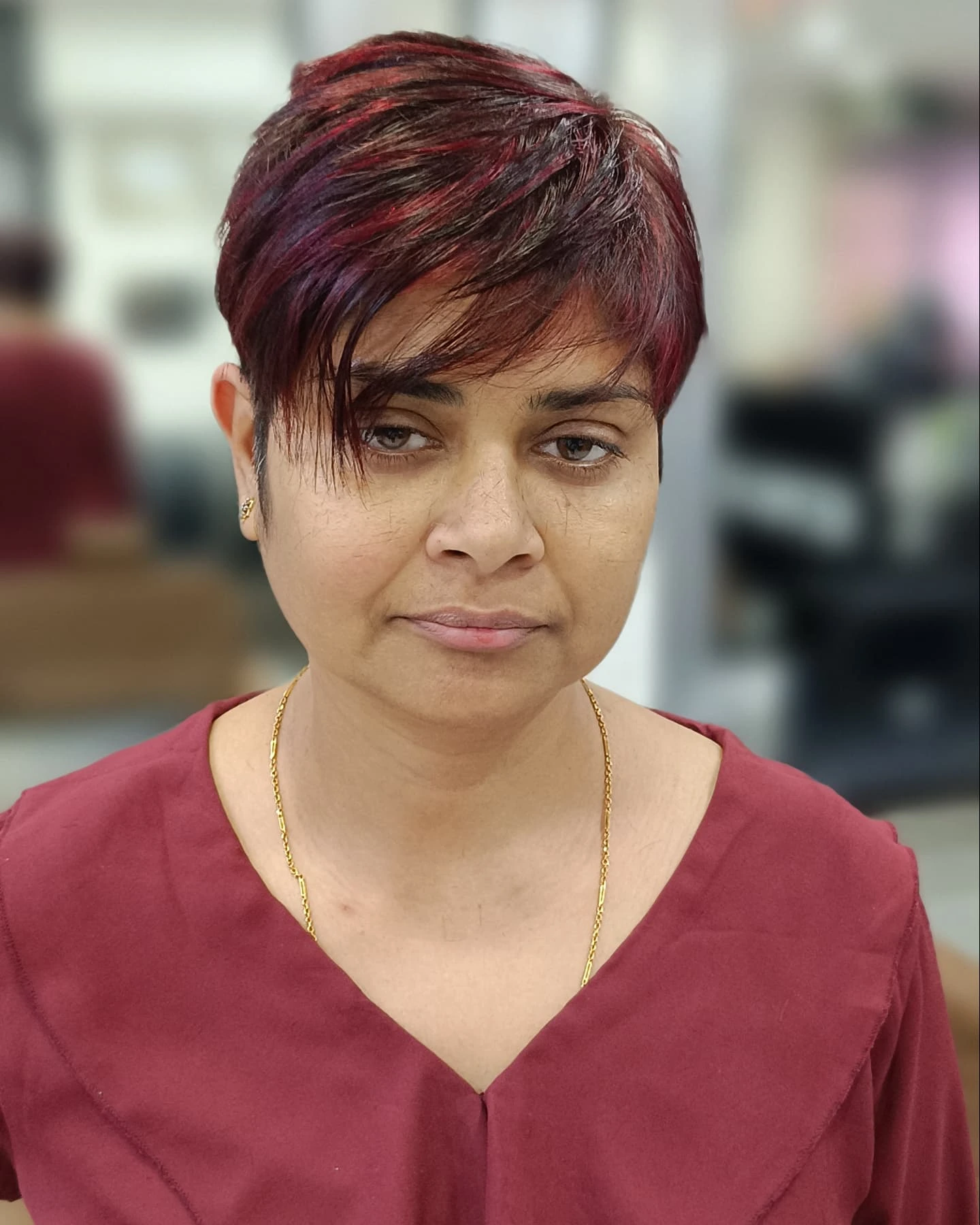 Chic Textured Funky Pixie with Bold Red Highlights