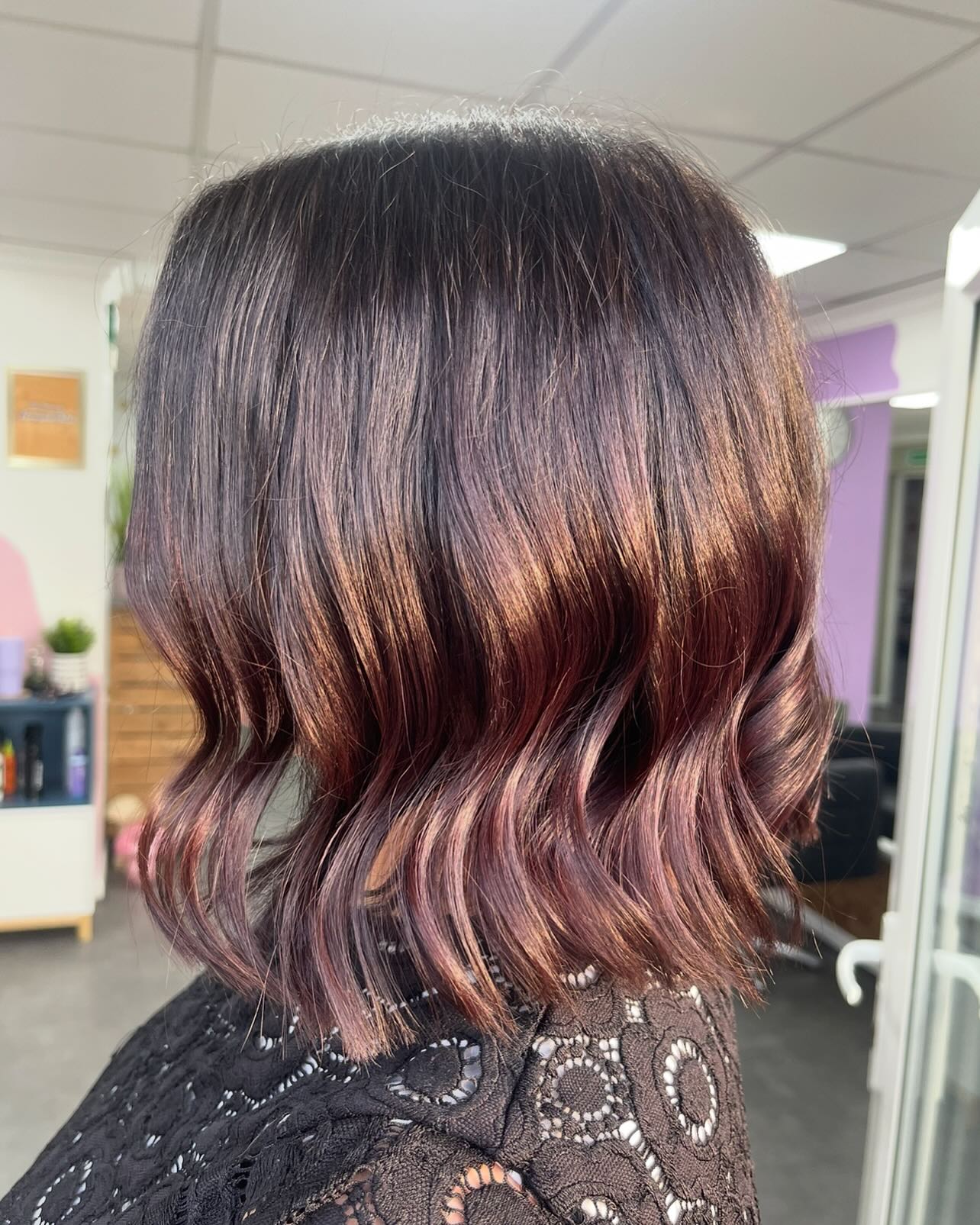 Chic Textured Long Bob with Warm Burgundy Highlights