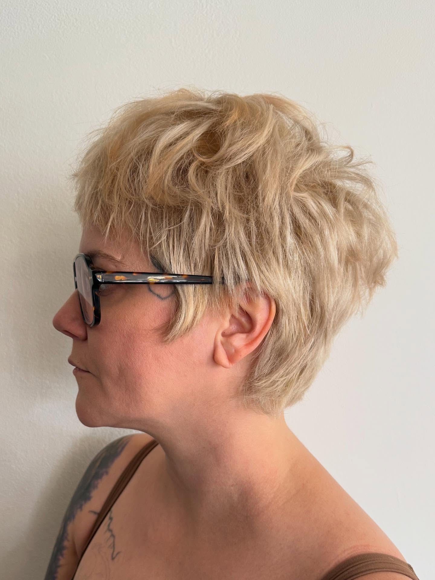 Choppy Textured Funky Pixie with Soft Blonde Highlights