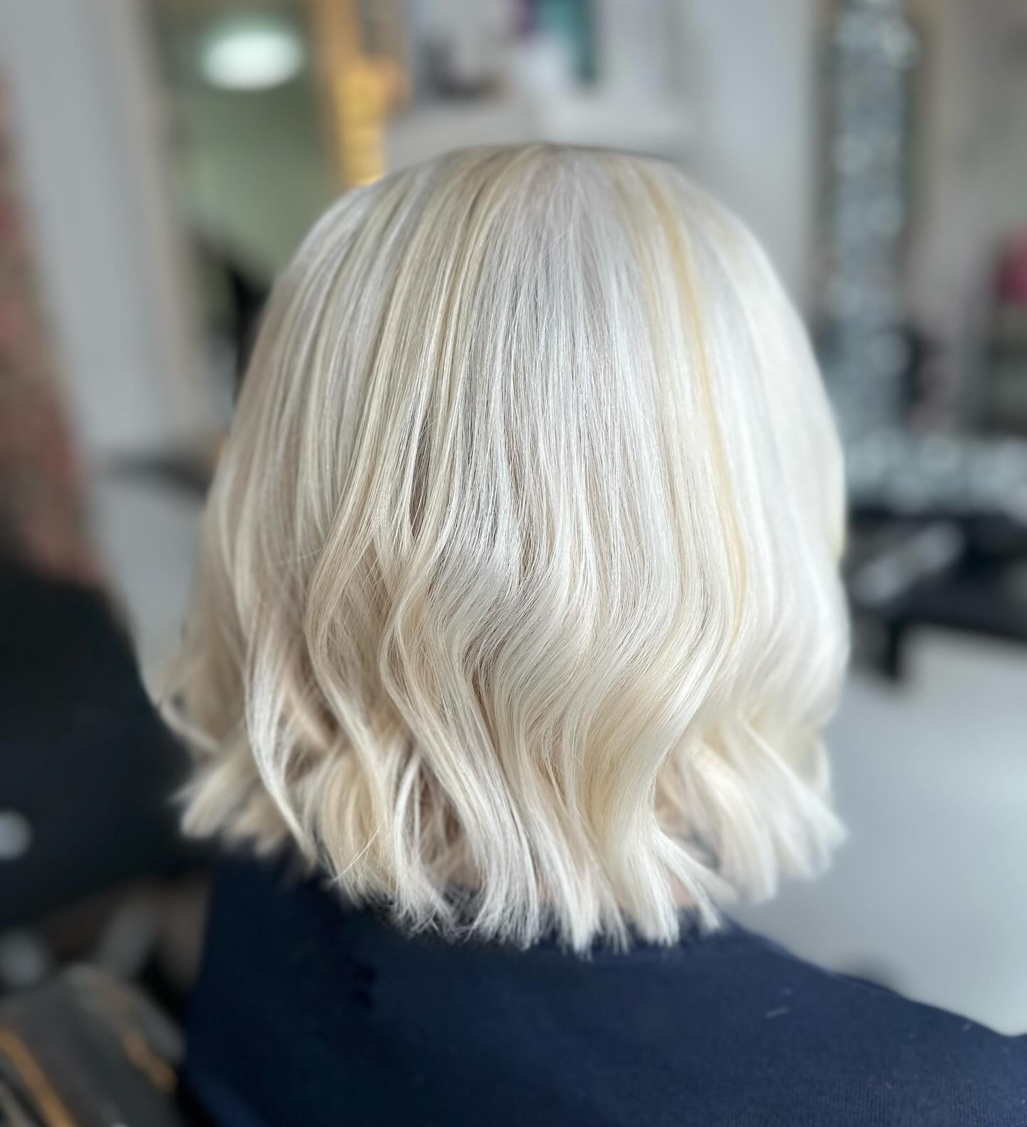 Elegant Soft-Wave Bob with Subtle Platinum Highlights