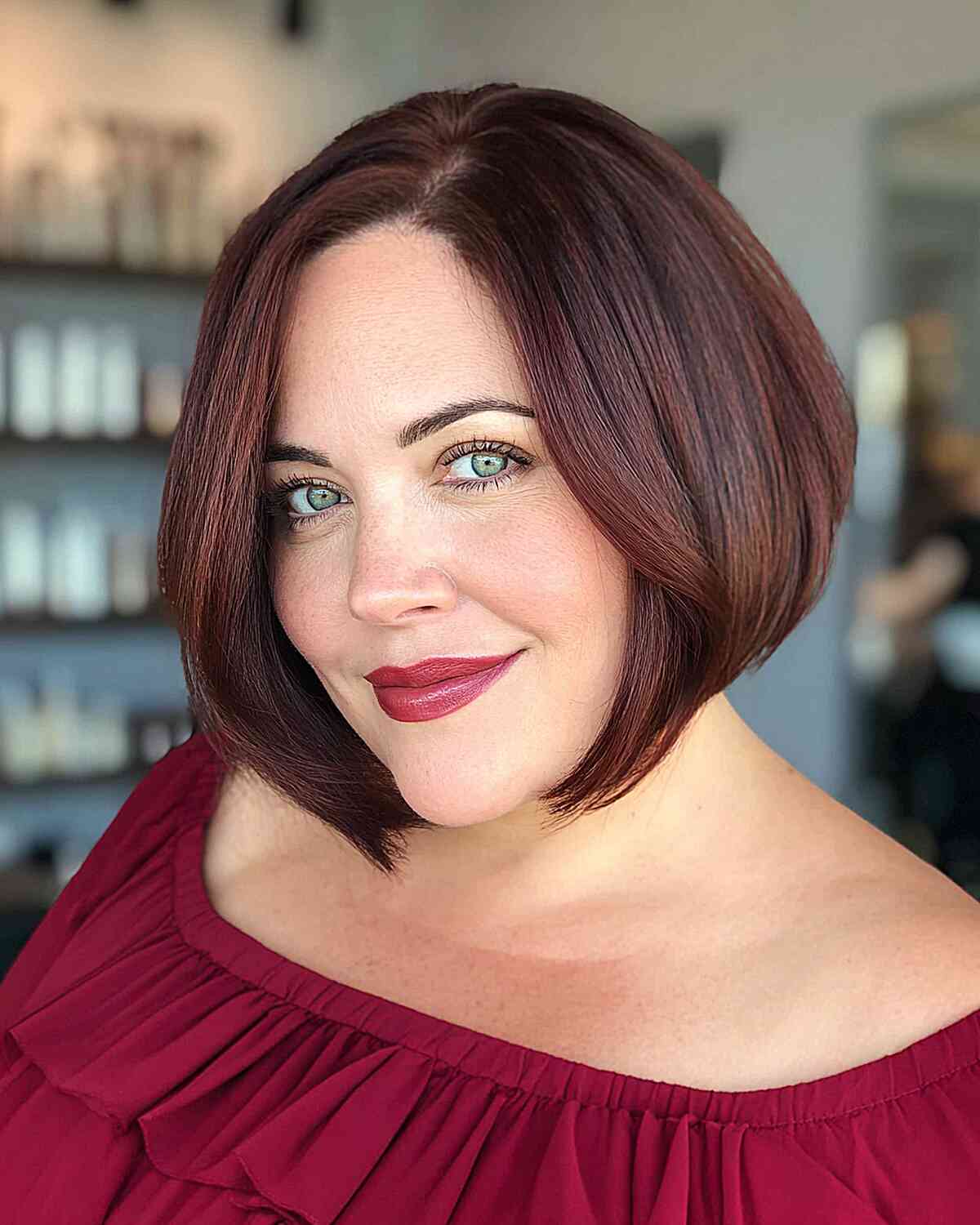 Sleek Side-Parted Bob with Rich Burgundy Color
