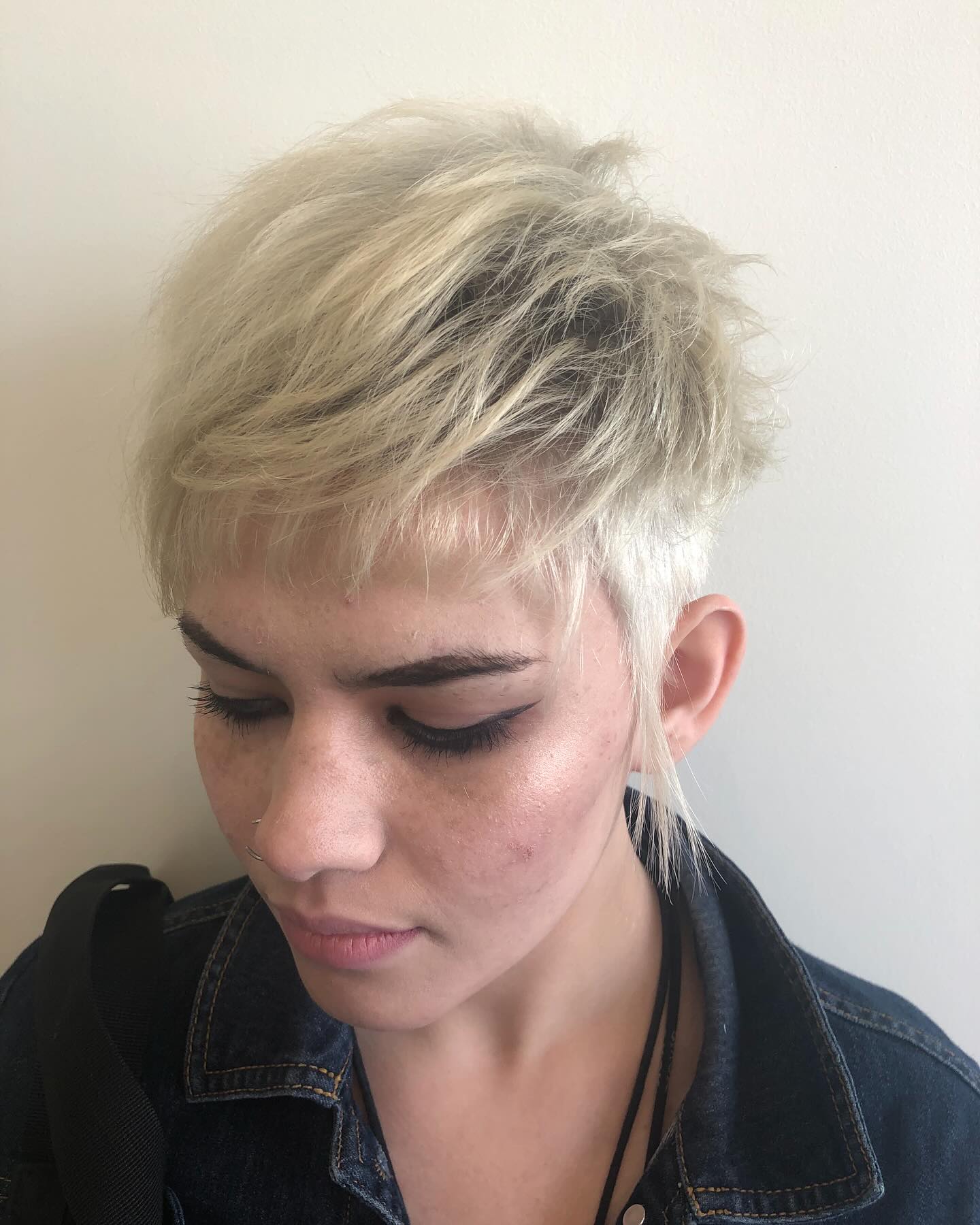 Textured Funky Pixie with Playful Layered Bangs