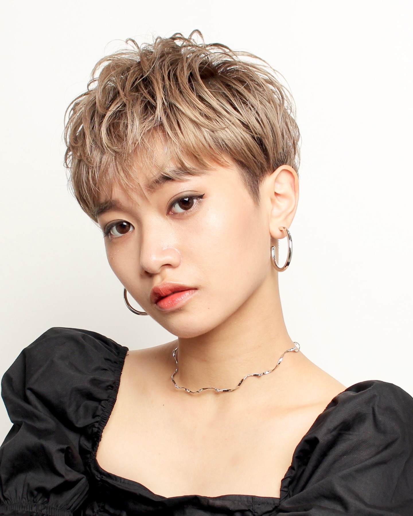 Textured Funky Pixie with Soft Ash Blonde Highlights