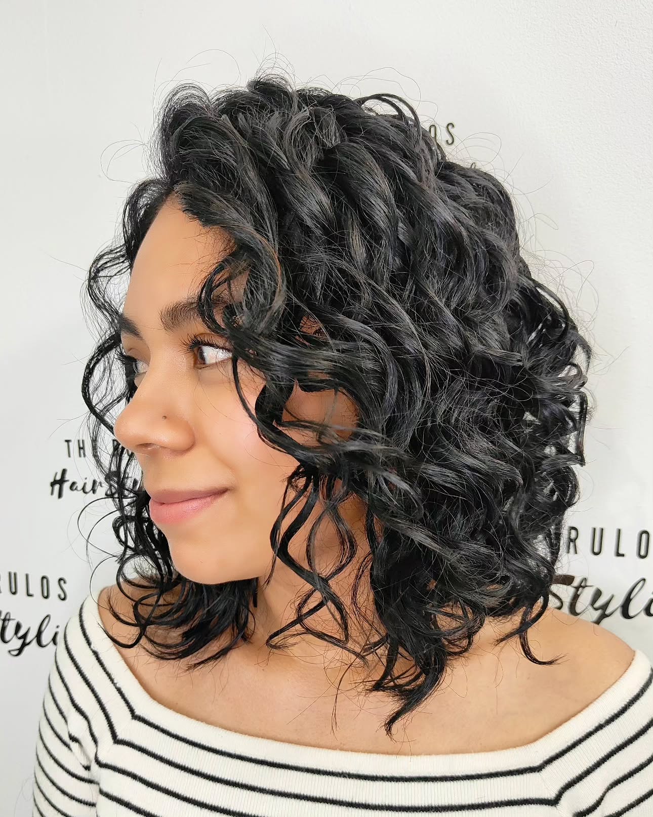 Textured Shoulder-Length Curly Cut for Fine Hair