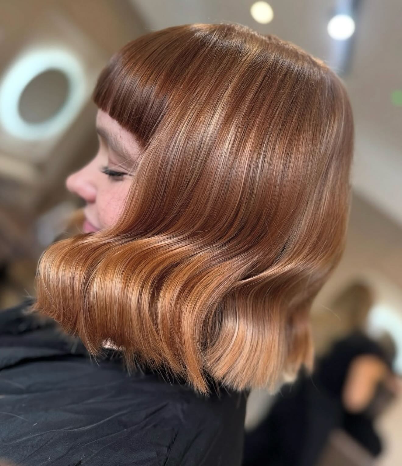 Warm Copper Soft-Wave Bob with Subtle Fringe