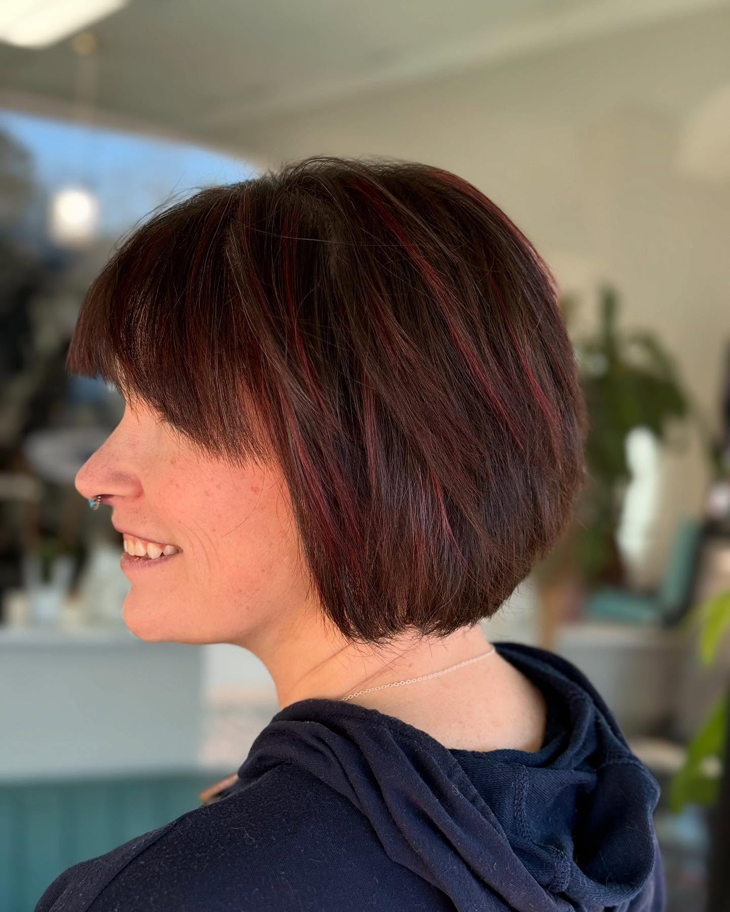 Bold Textured Bob with Subtle Red Highlights