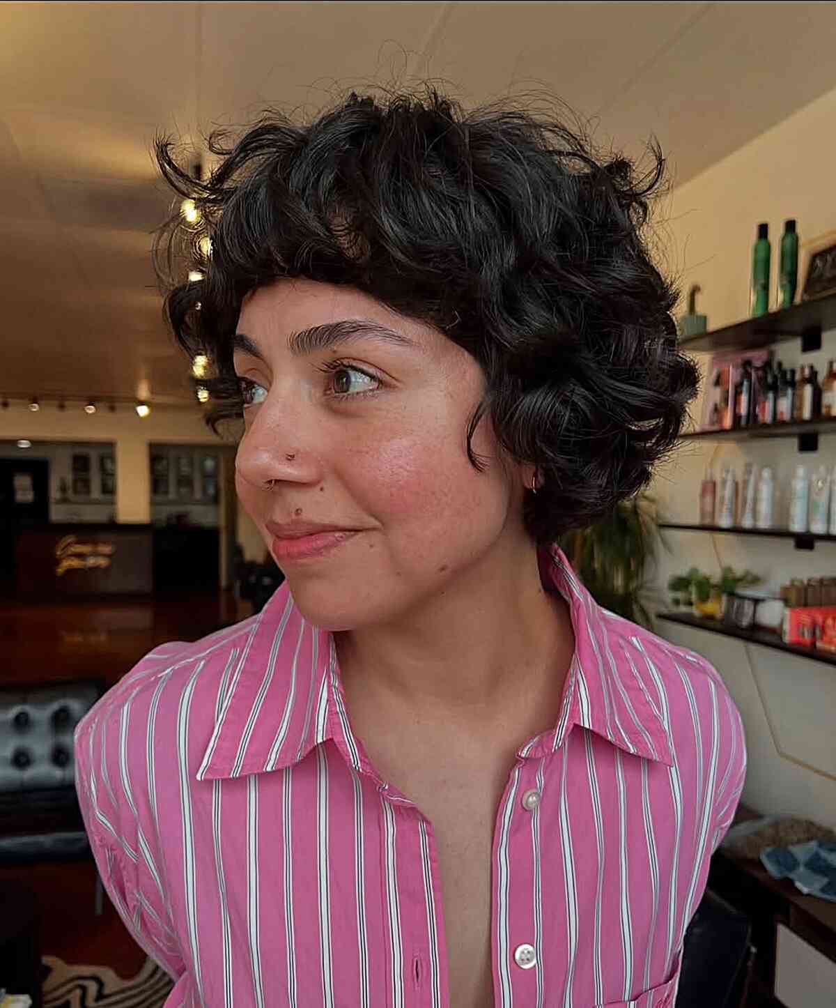 Playful Short Curly Bob with Bangs