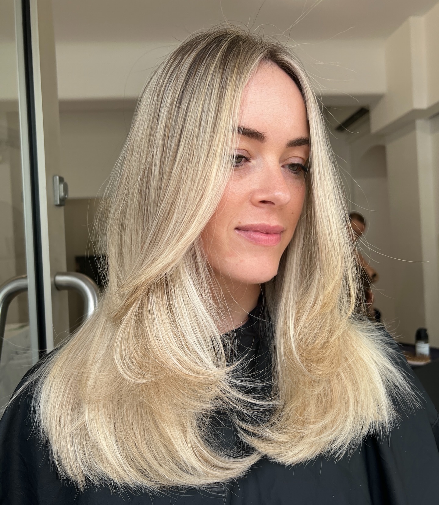Soft Layered Cut with Subtle Face Framing