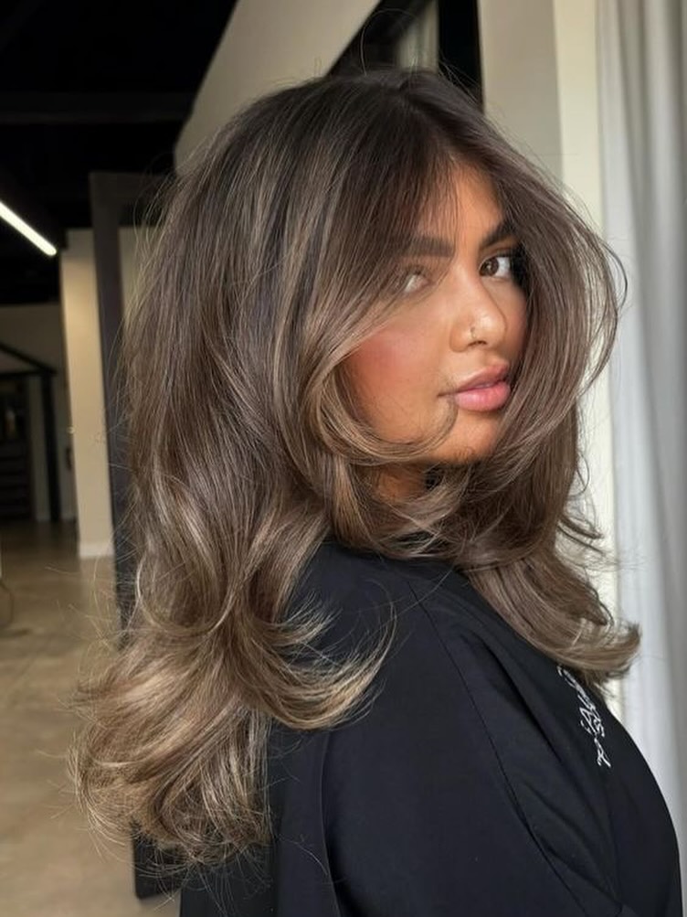 Softly Layered Brown Haircut with Natural Movement