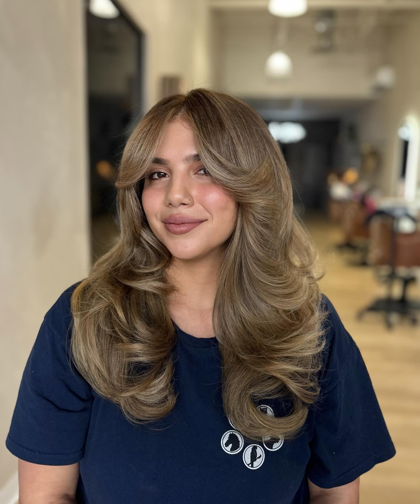 Volume-Enhancing Long Layered Cut with Face-Framing Bangs