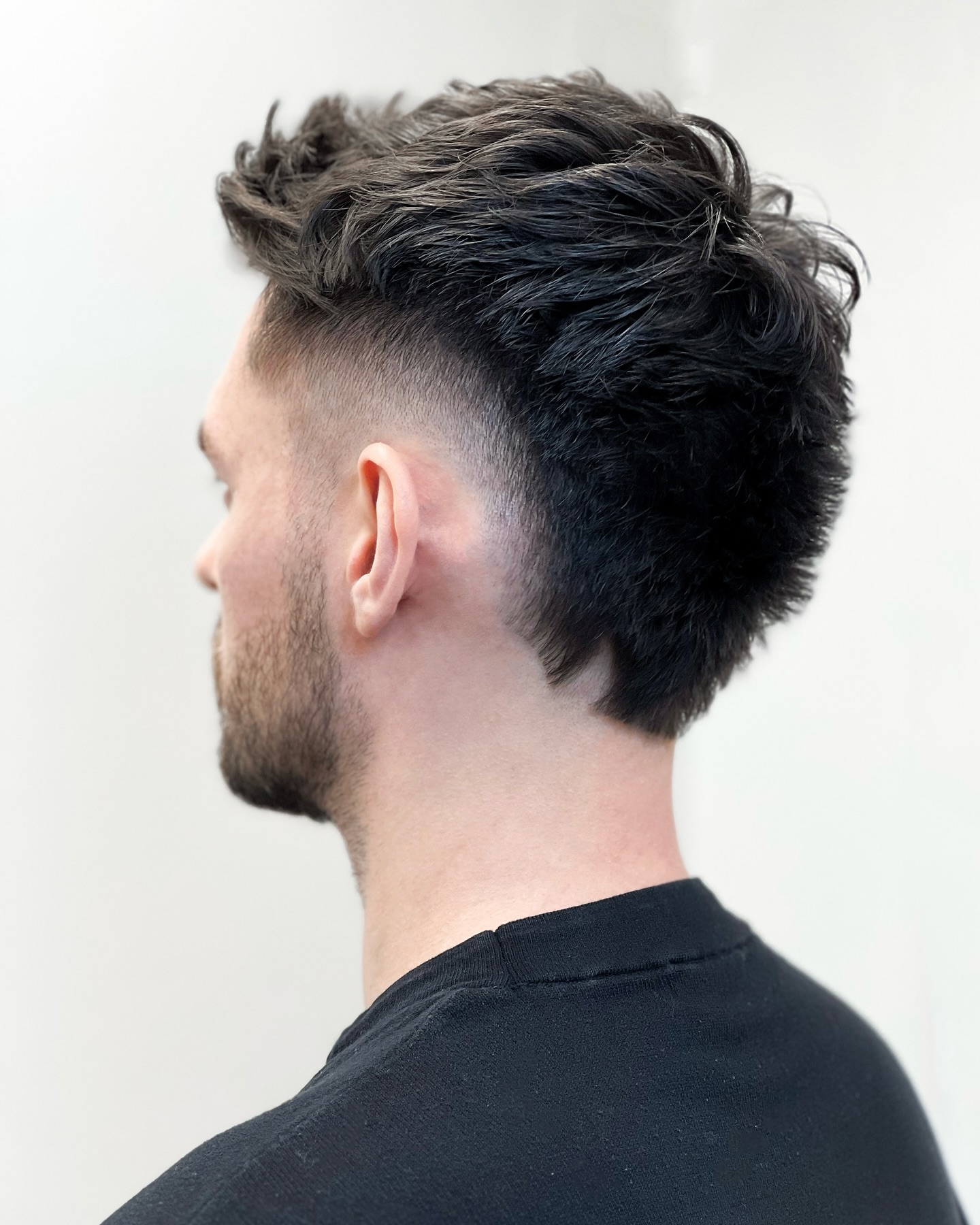Edgy Burst Fade Mohawk with Textured Top