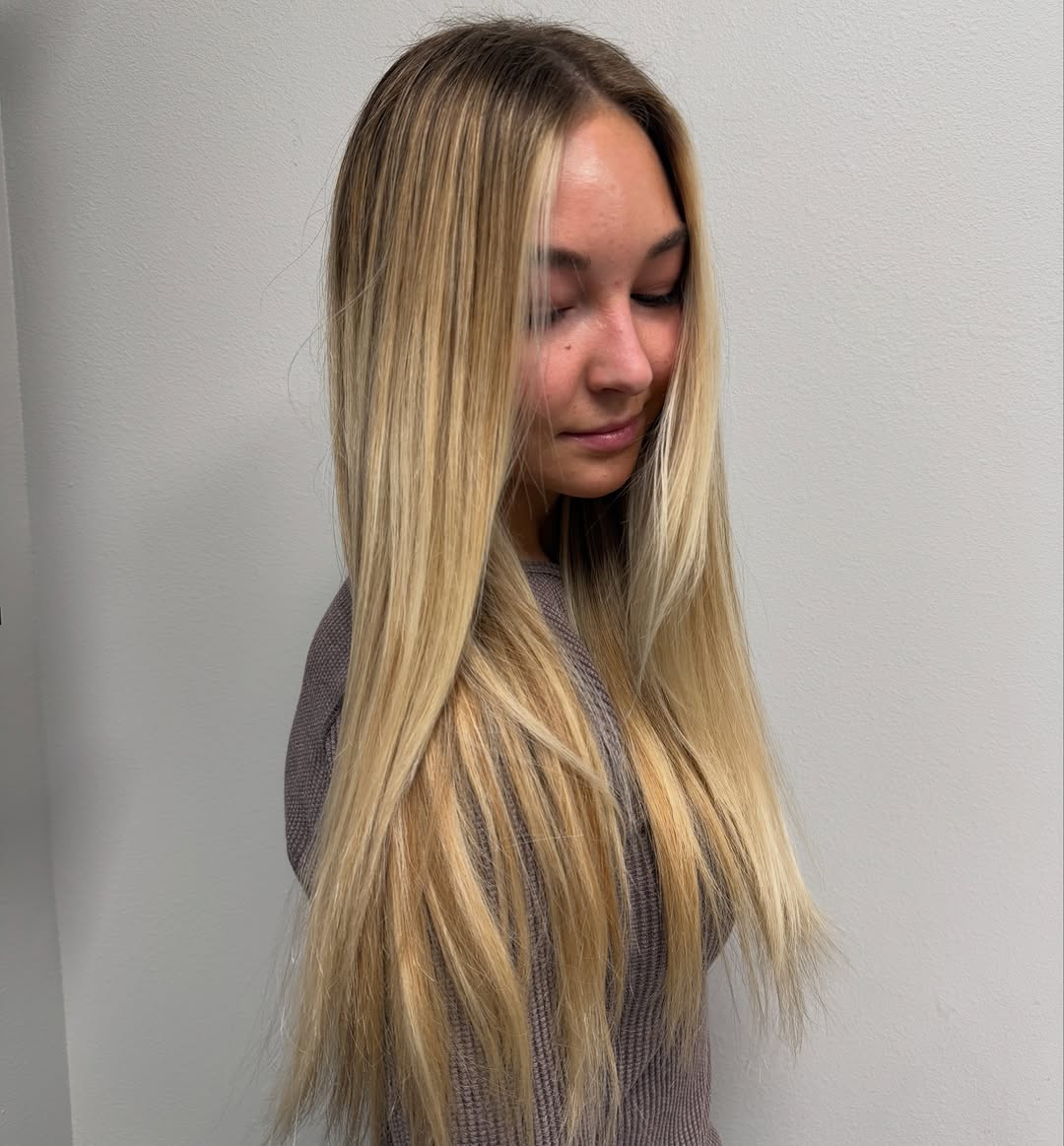 Radiant Soft Root Melt Blonde Balayage with Sleek Layers