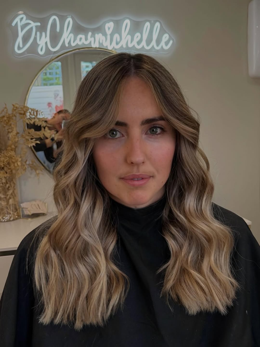 Soft Root Melt Blonde Balayage with Loose Waves