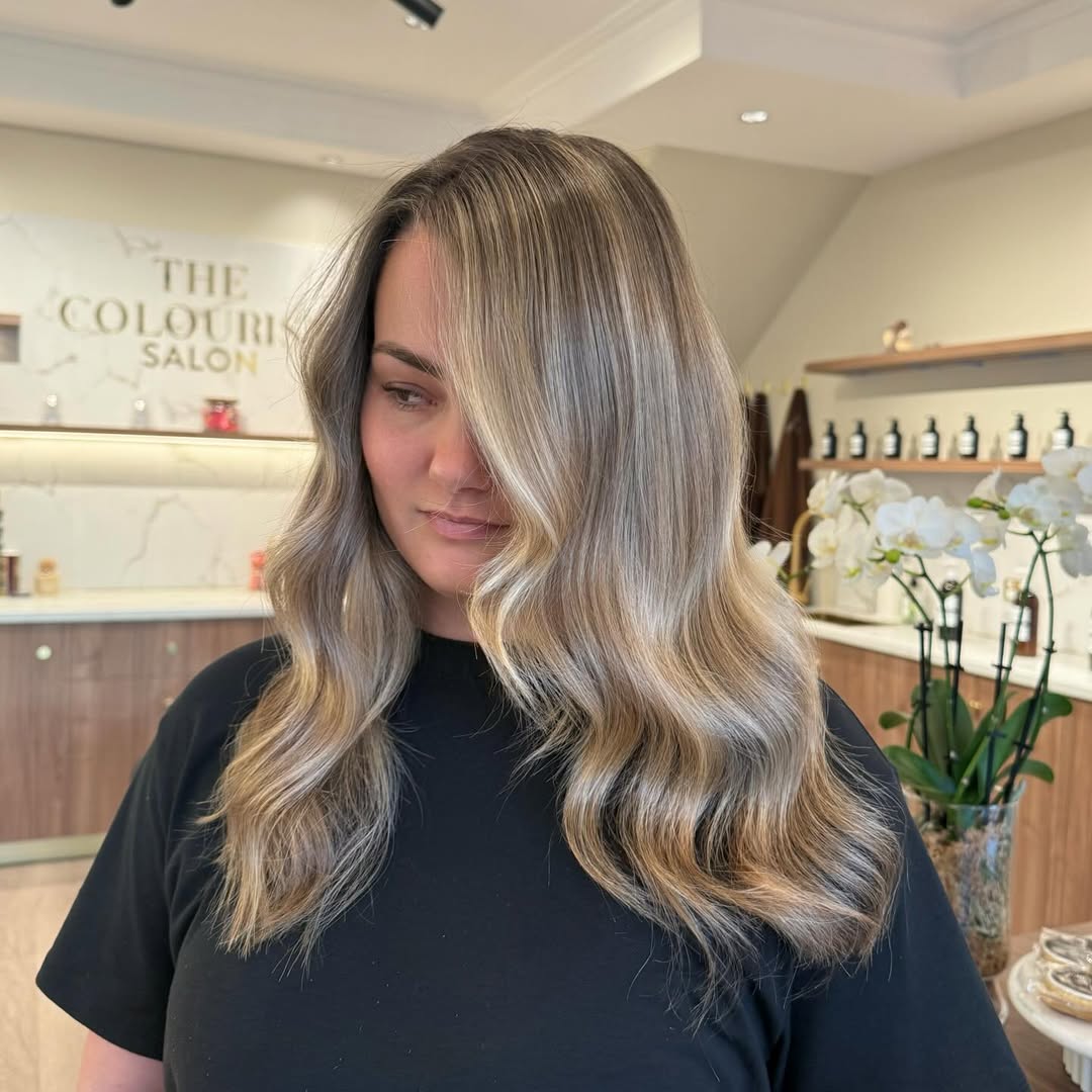 Textured Soft Root Melt Blonde Balayage with Flowing Waves