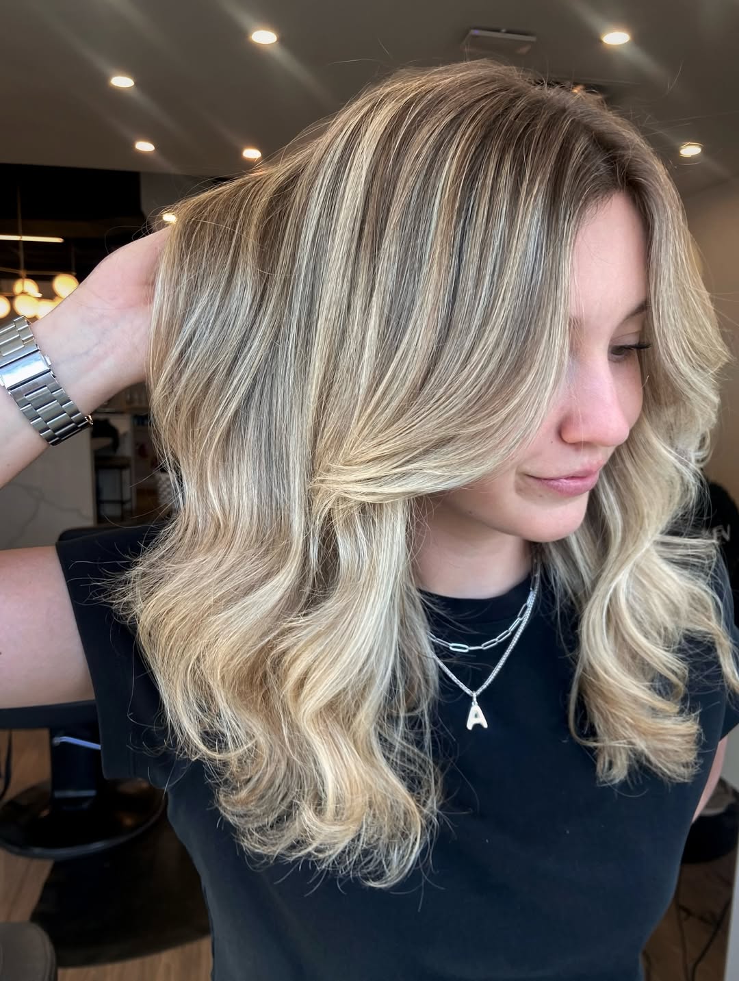 Textured Soft Root Melt Blonde Balayage with Loose Curls