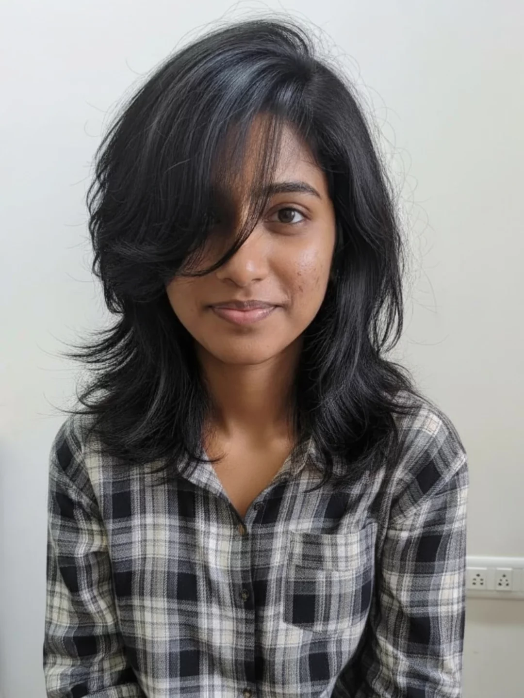 Dynamic Layered Shoulder-Length Cut with Feathered Ends