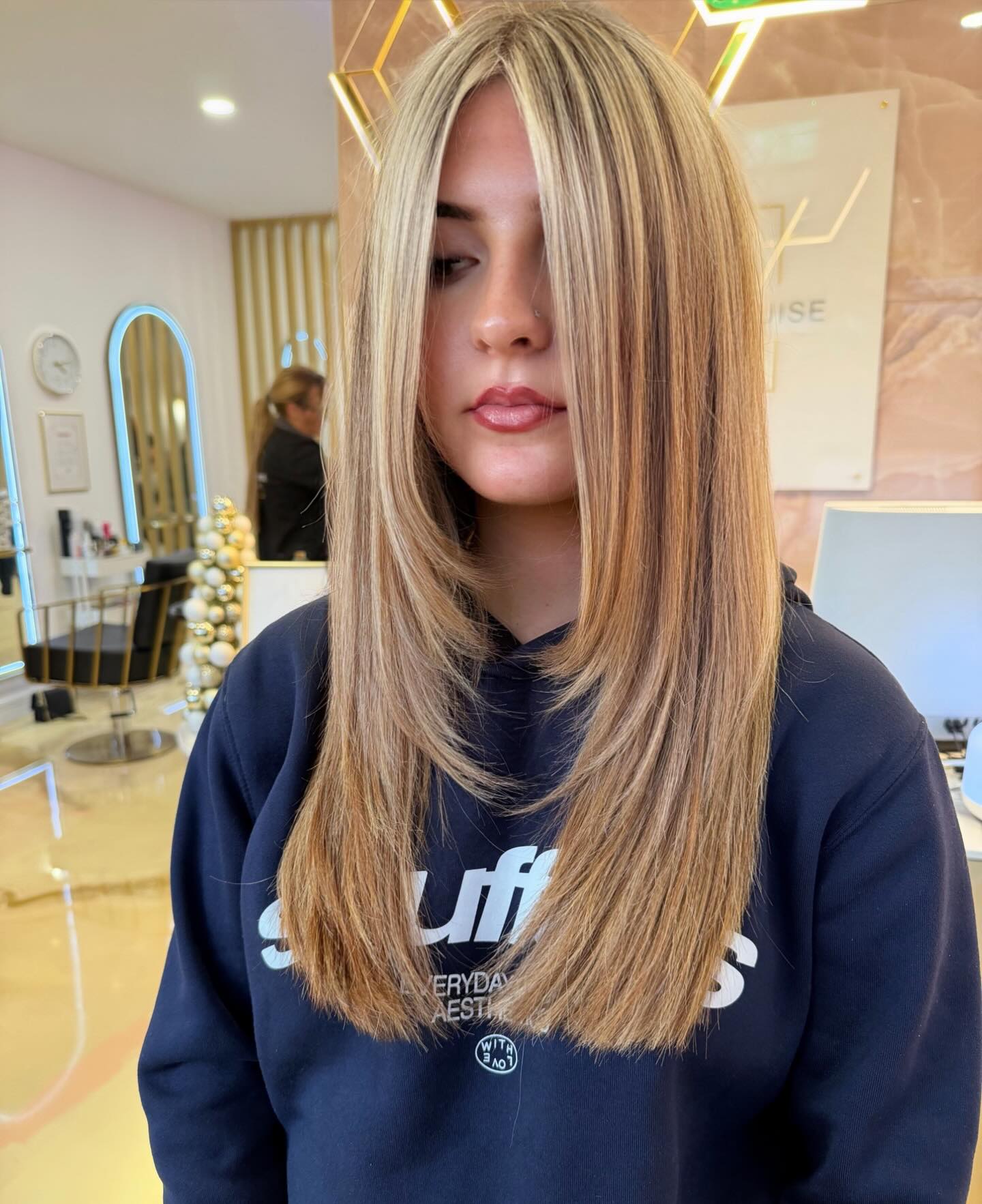 Sleek Long Layered Cut with Subtle Highlights