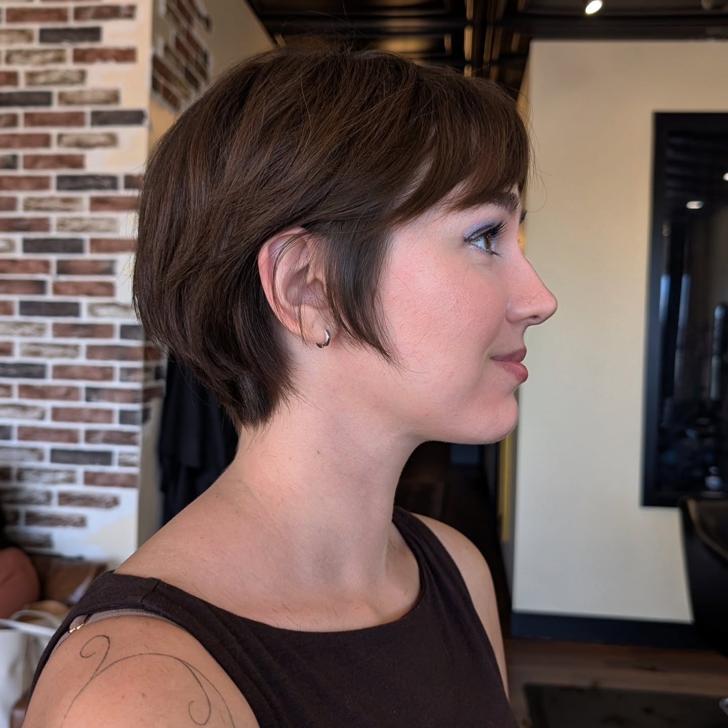 Textured Short Pixie Cut with Subtle Face-Framing Layers