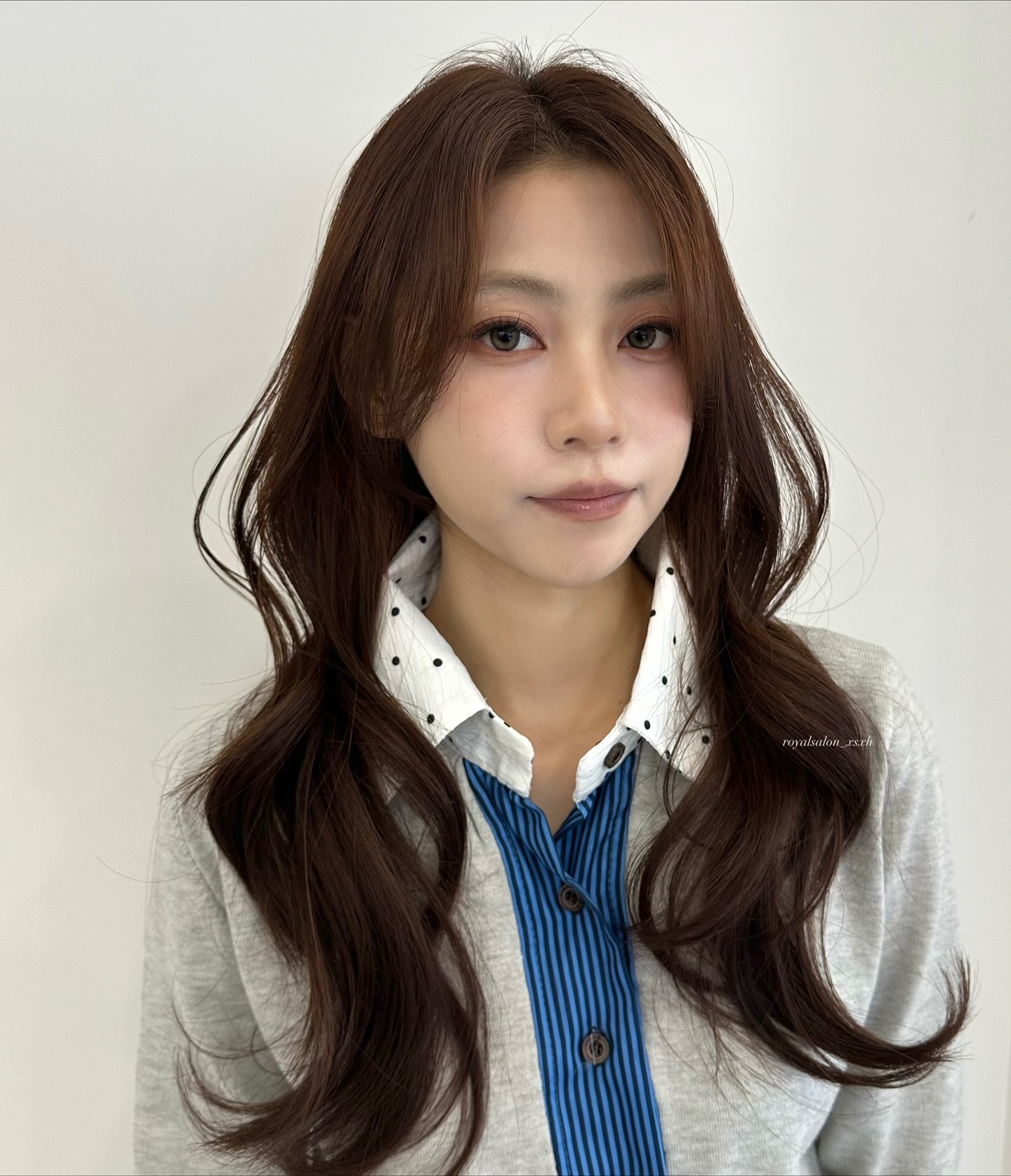 Elegant Long Face-Framing Layers with Subtle Waves