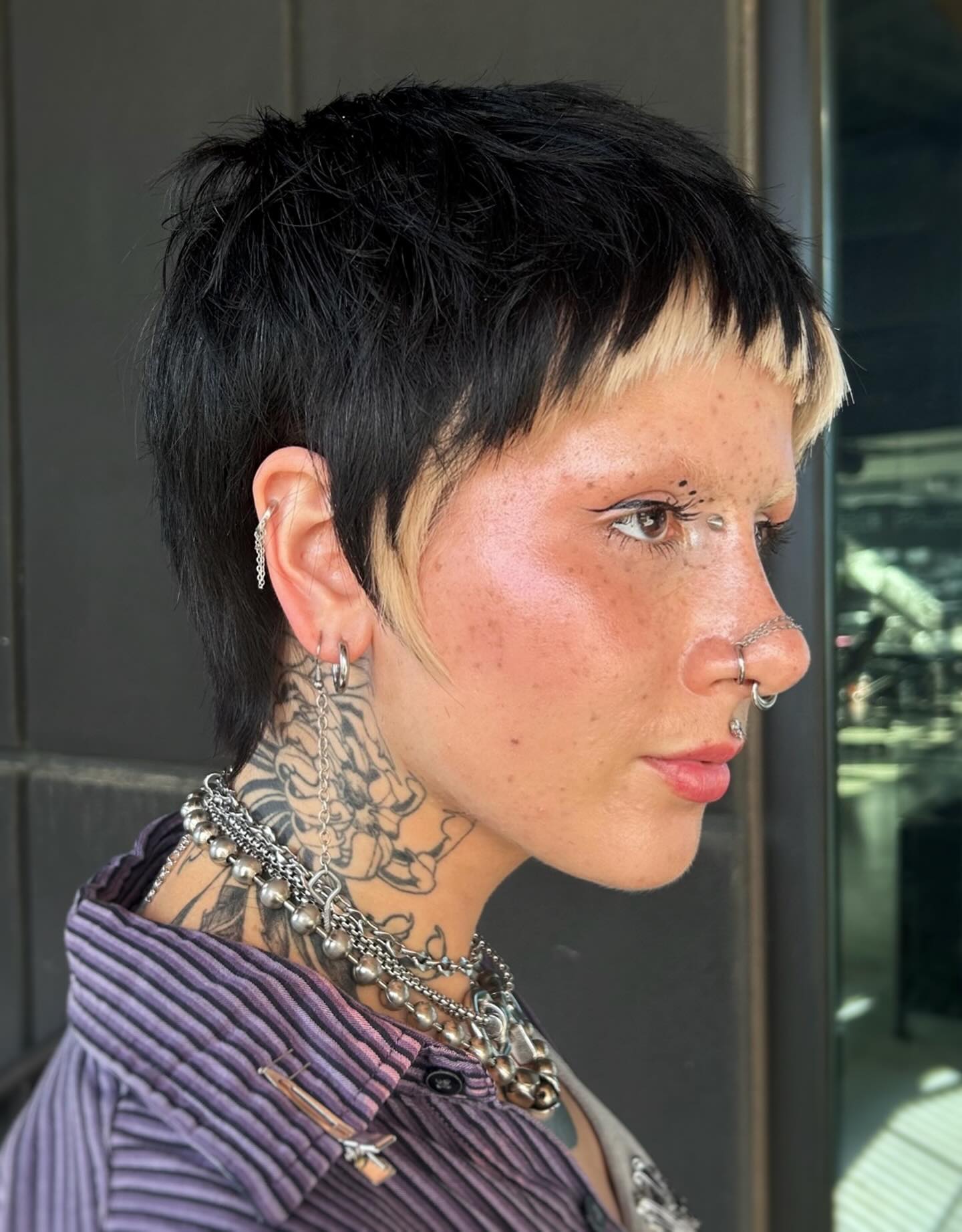 Bold Textured Pixie Wolf Cut with Contrasting Highlights
