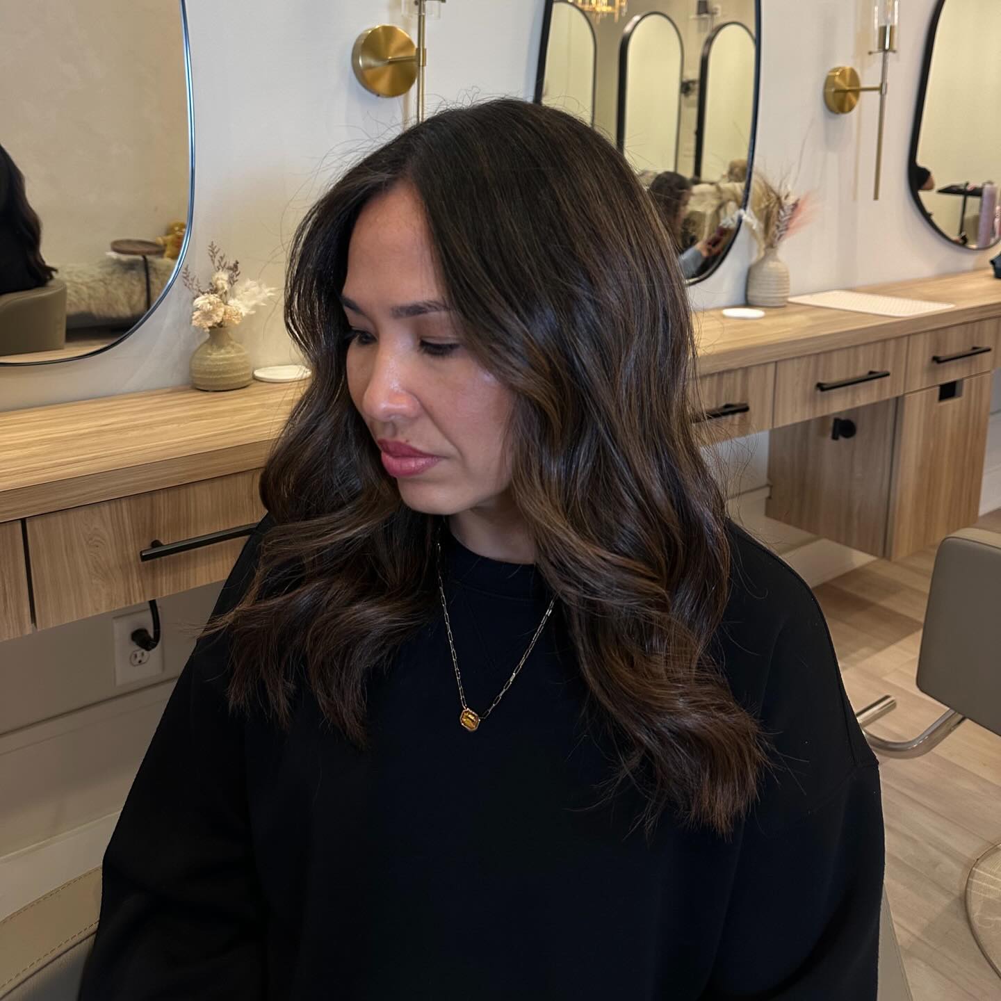 Chic Brunette Waves with Soft Face-Frame Layers