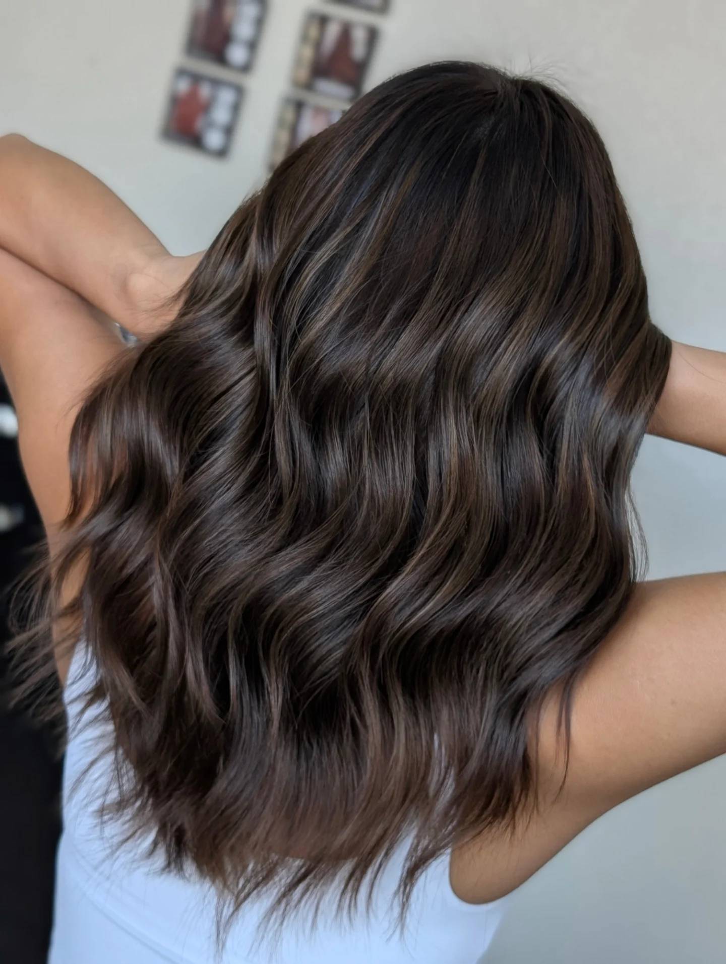 Chic Long Brunette Waves with Subtle Dimension