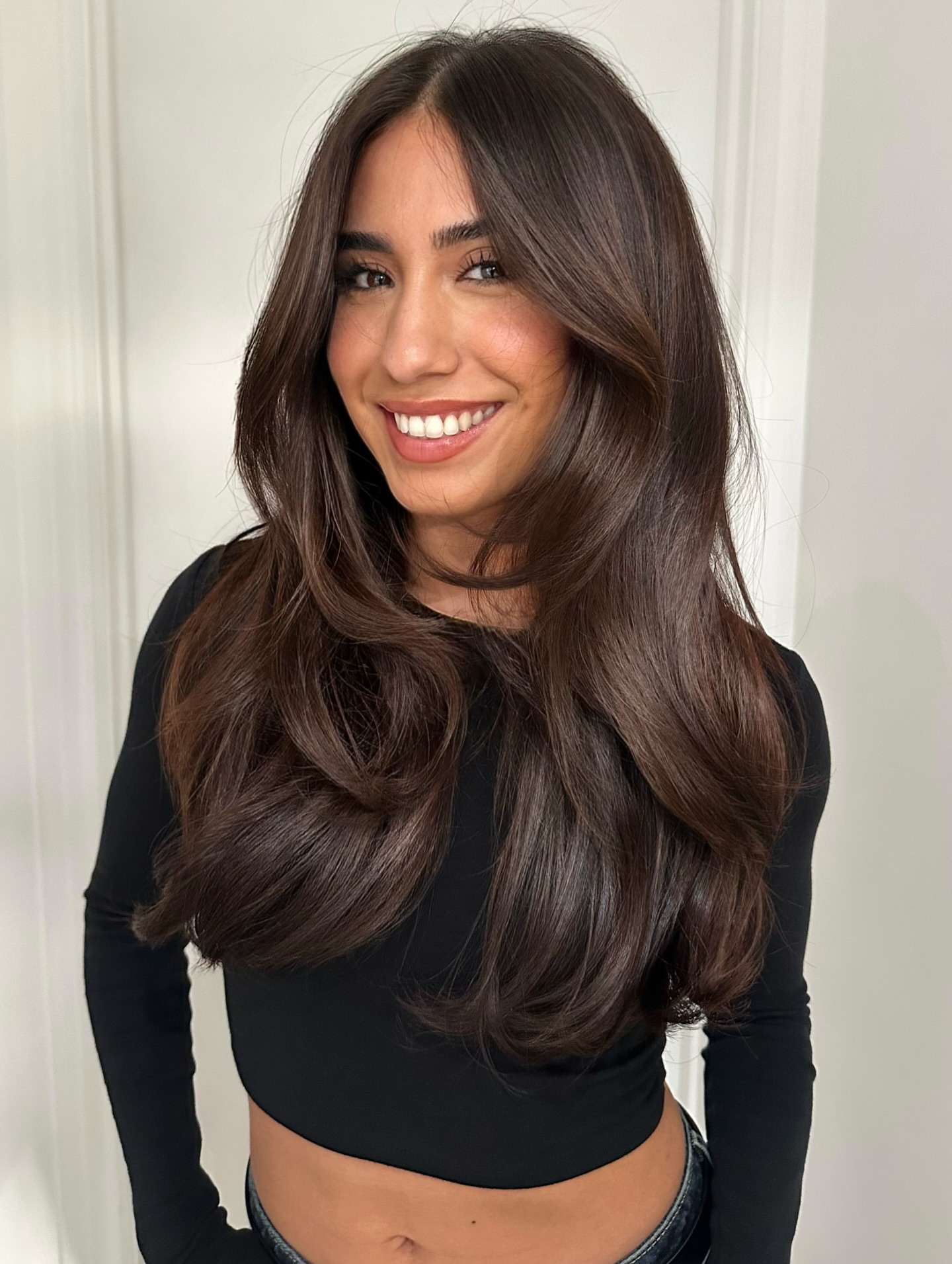 Glossy Brunette Layers with Face-Framing Bangs