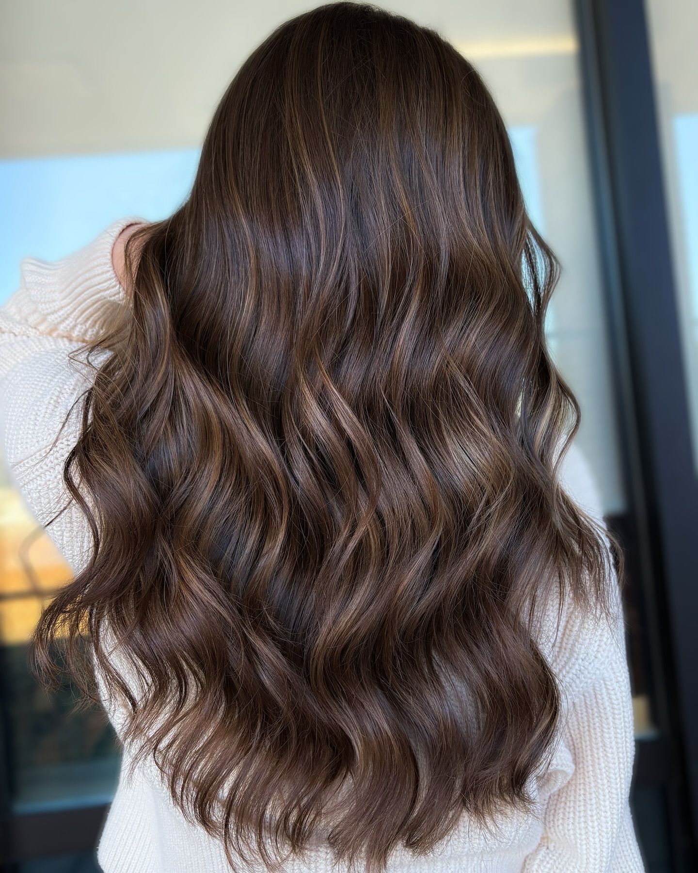 Gorgeous Brunette Waves with Luminous Highlights