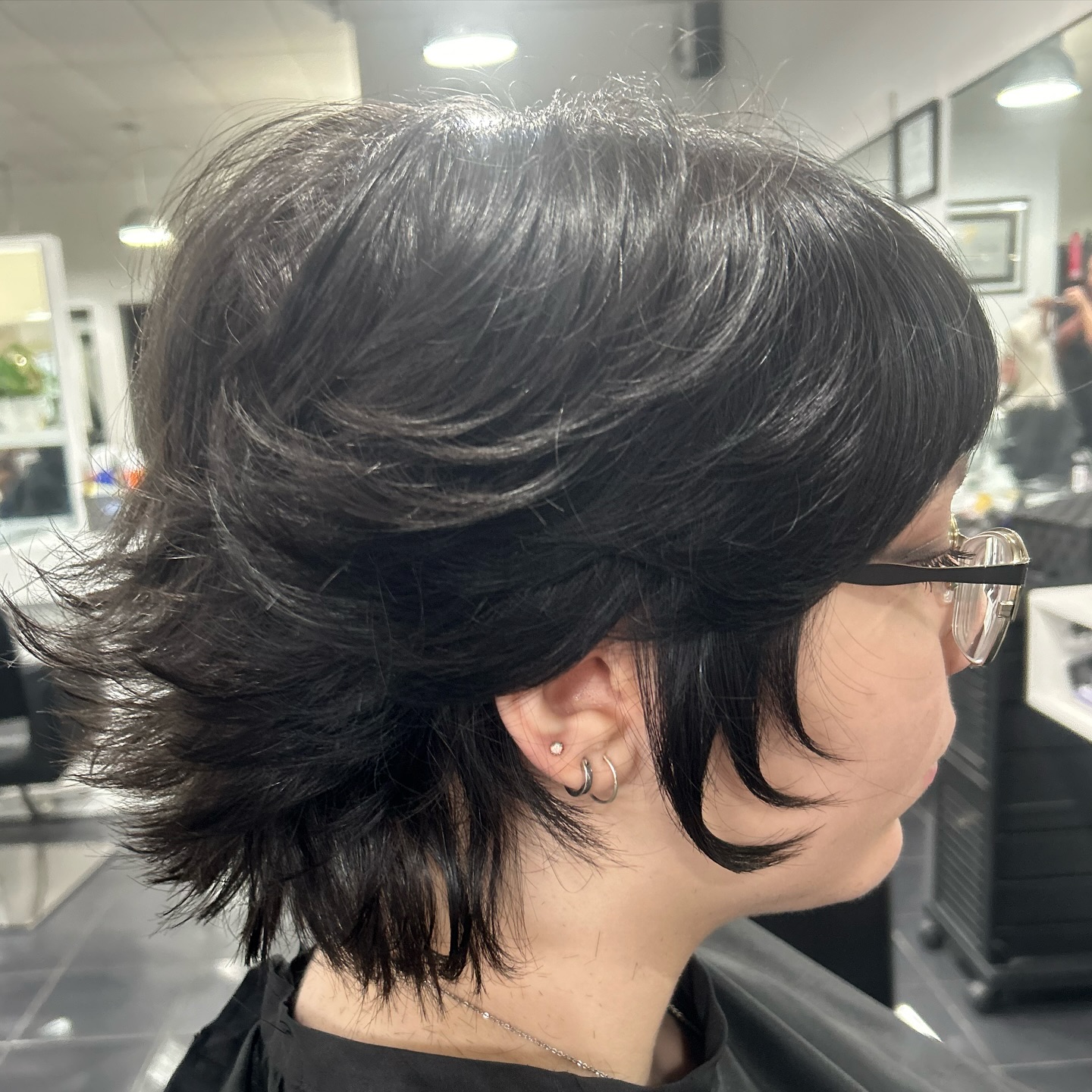 Jet-Black Shaggy Wolf Cut with Splendid Volume