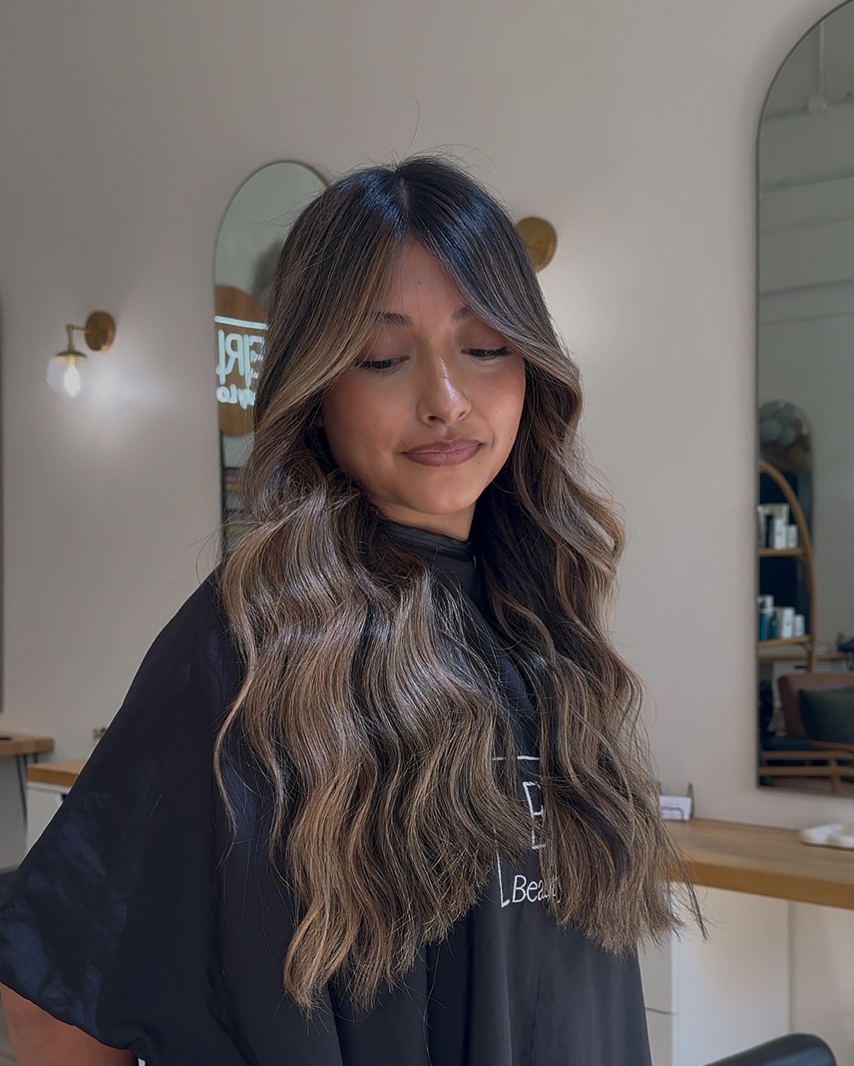 Long and Lush Brunette Waves with Subtle Highlights