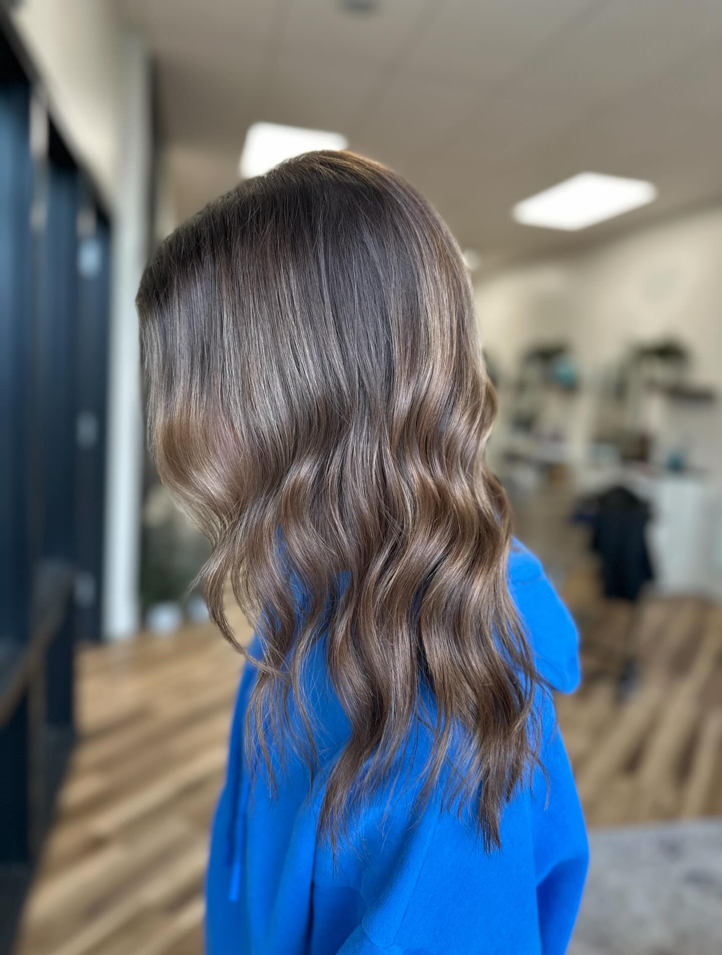 Modern Wavy Brunette with Subtle Highlights