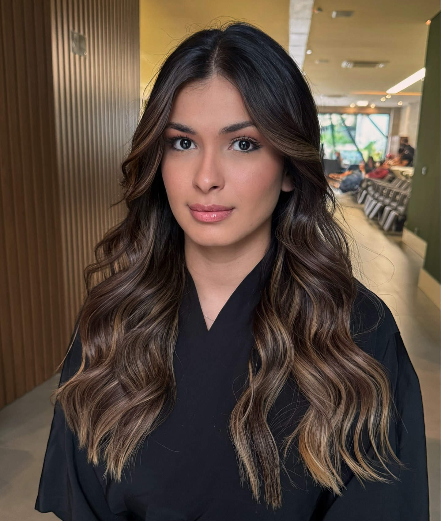 Rich Brunette Waves with Flattering Face-Frame Layers