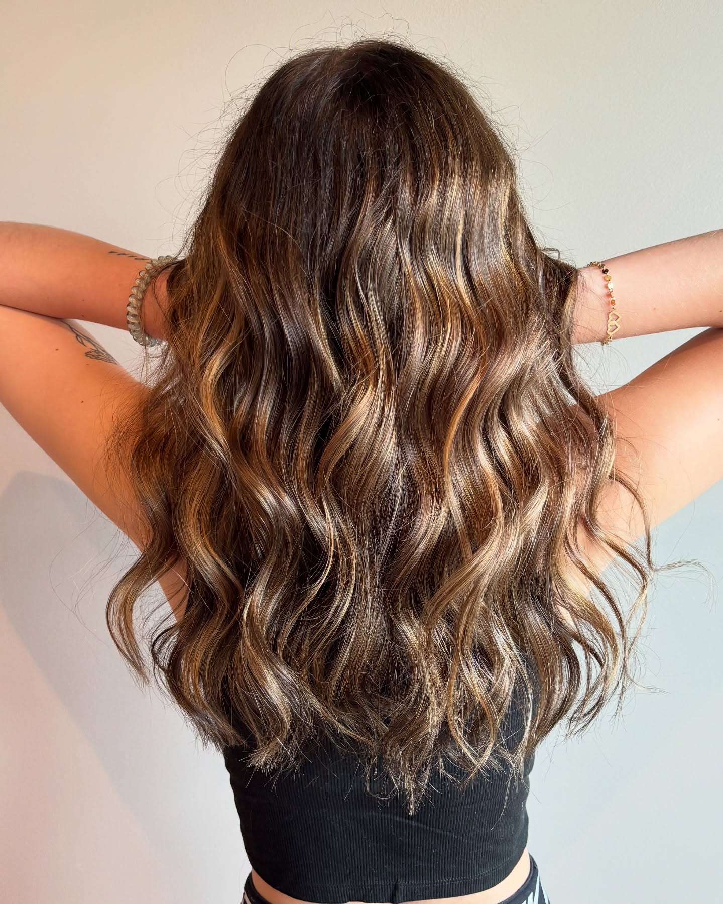 Sun-Kissed Brunette Waves with Textured Ends