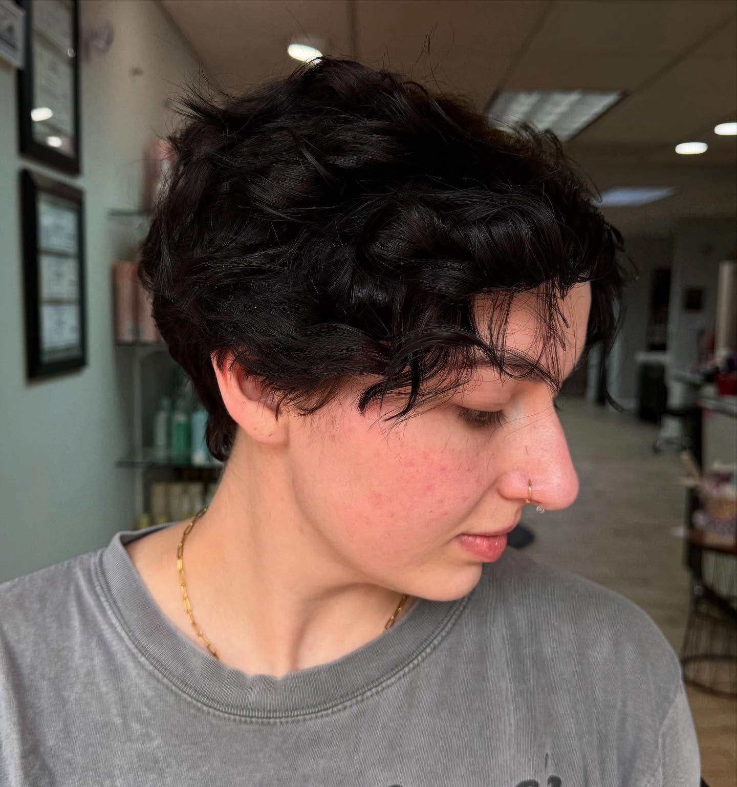 Textured Black Pixie Wolf Cut with Gentle Waves