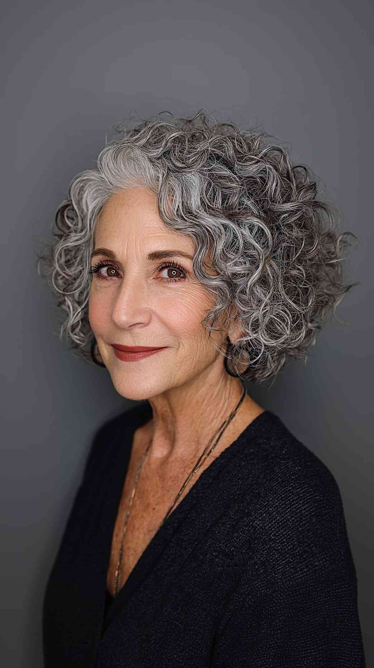 Textured Short Curly Cut with Grey Highlights